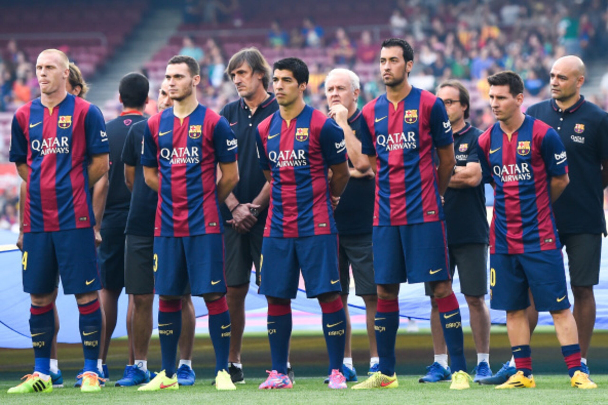 BARCELONA, SPAIN - AUGUST 18:  (L-R) Jeremy Mathieu, Thomas Vermaelen, Luis Suarez, Sergio Busquets and Lionel Messi of FC Barcelona looks on during the official presentation of the FC Barcelona prior to the Joan Gamper Trophy match between FC Barcelona a