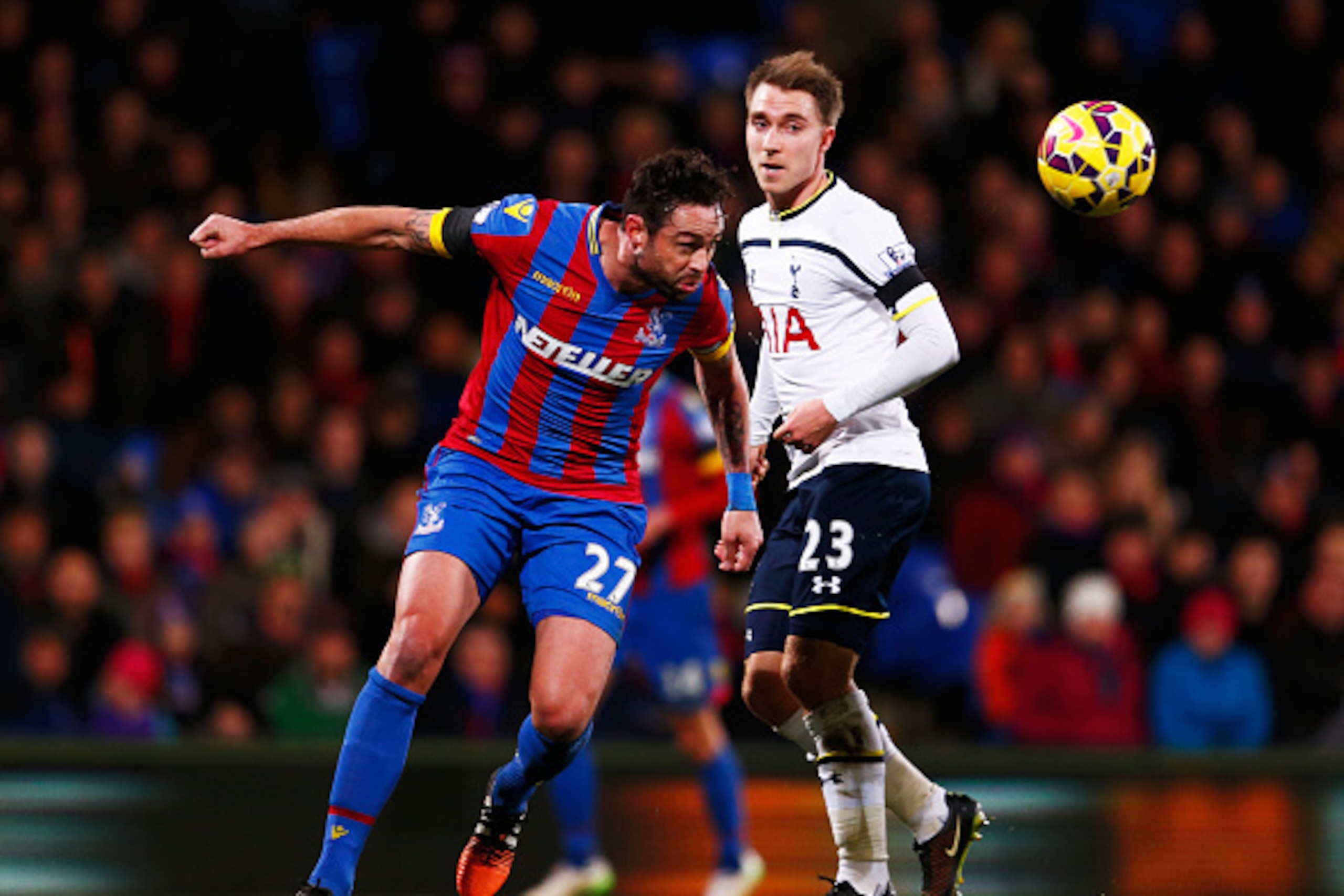 LONDON, ENGLAND - JANUARY 10: Damien Delaney of Crystal Palace heads clear from Christian Eriksen of Spurs during the Barclays Premier League match between Crystal Palace and Tottenham Hotspur at Selhurst Park on January 10, 2015 in London, England. (Ph LONDON, ENGLAND - JANUARY 10: Damien Delaney of Crystal Palace heads clear from Christian Eriksen of Spurs during the Barclays Premier League match between Crystal Palace and Tottenham Hotspur at Selhurst Park on January 10, 2015 in London, England. (Ph