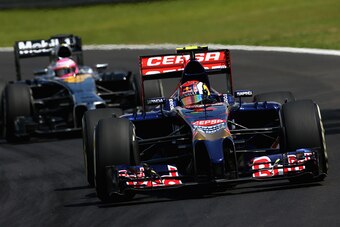 SAO PAULO, BRAZIL - NOVEMBER 09:  Daniil Kvyat of Russia and Scuderia Toro Rosso drives during the Brazilian Formula One Grand Prix at Autodromo Jose Carlos Pace on November 9, 2014 in Sao Paulo, Brazil.  (Photo by Clive Mason/Getty Images)