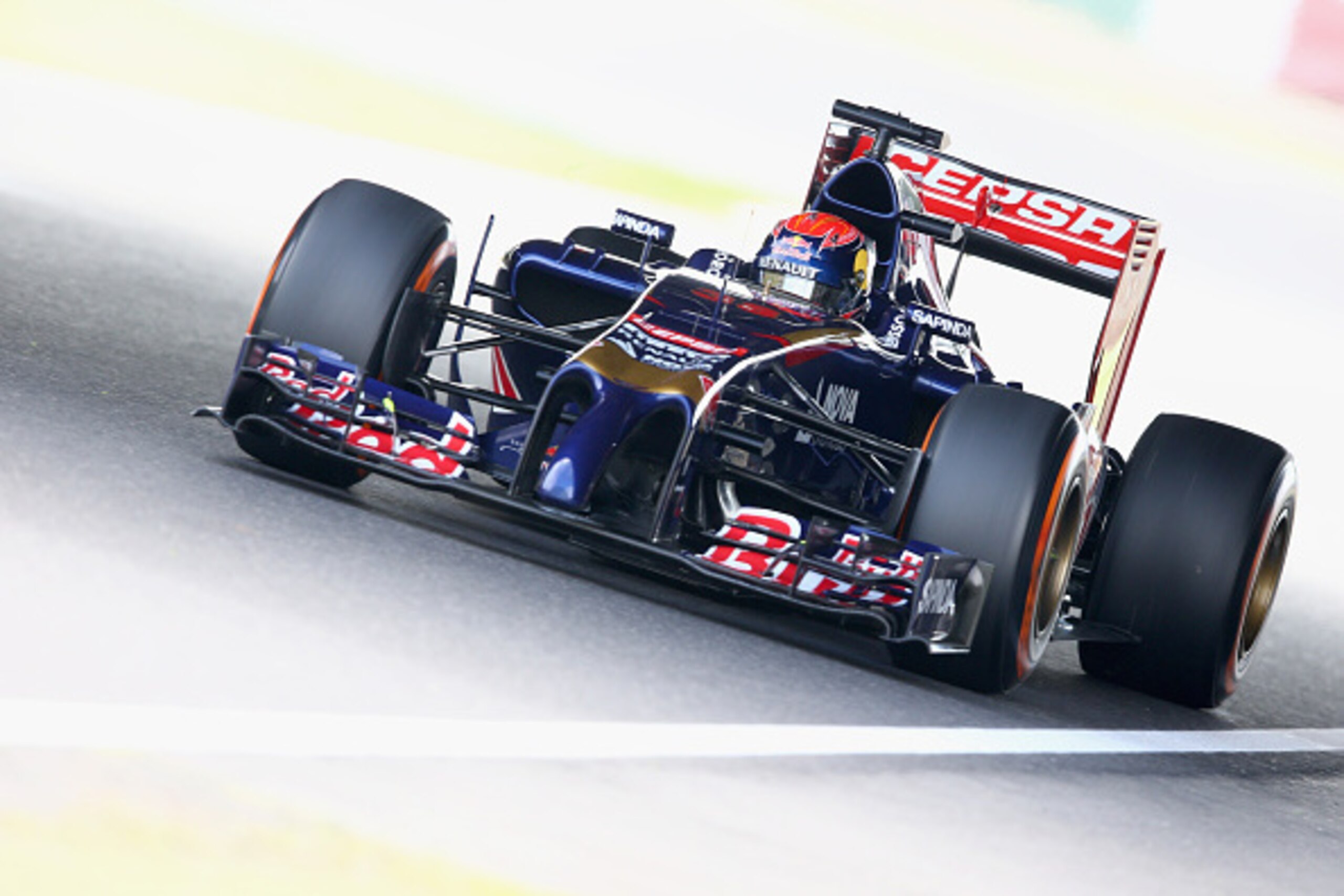 SUZUKA, JAPAN - OCTOBER 03:  Max Verstappen of Netherlands and Scuderia Toro Rosso drives during practice for the Japanese Formula One Grand Prix at Suzuka Circuit on October 3, 2014 in Suzuka, Japan.  (Photo by Clive Mason/Getty Images)
