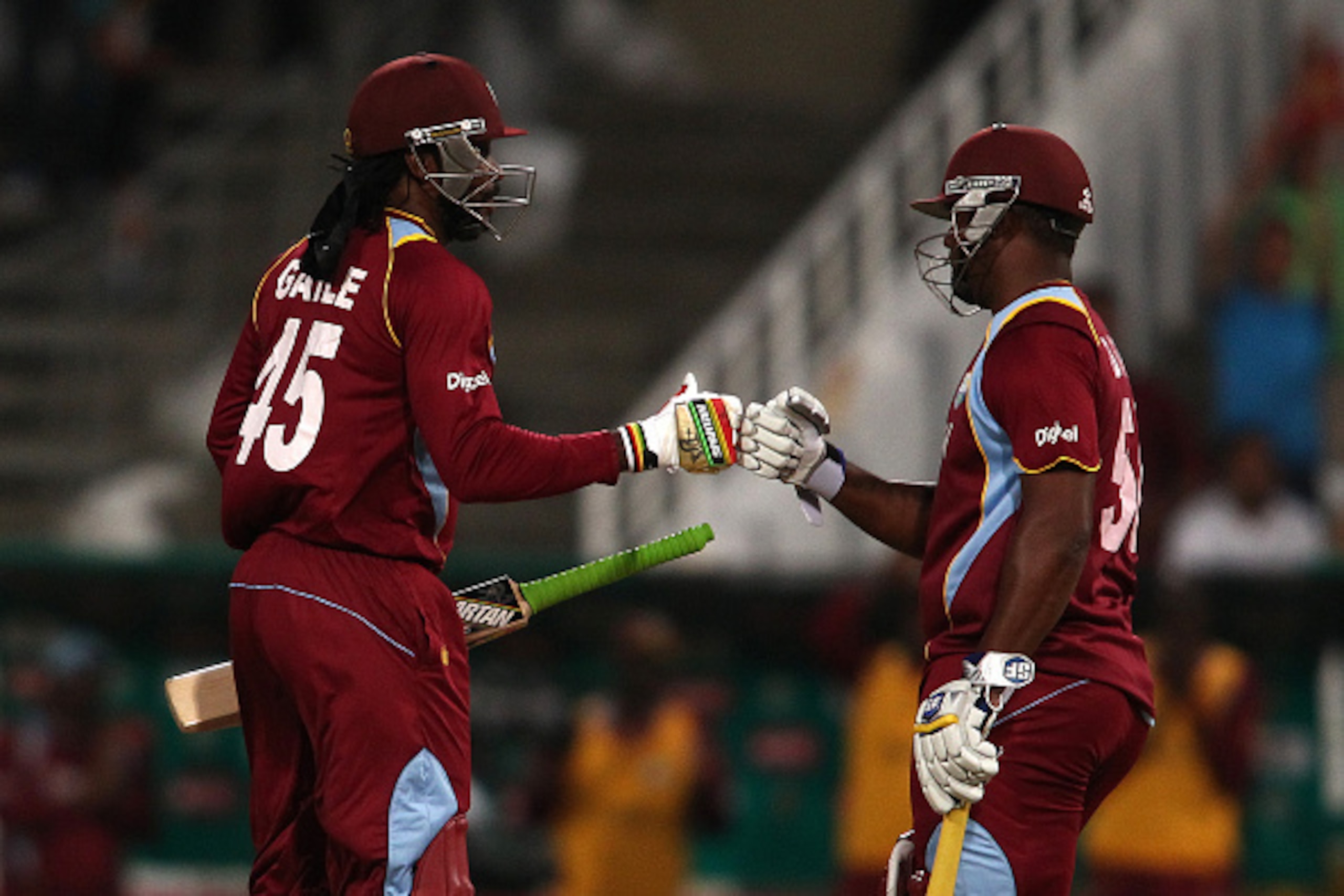 CAPE TOWN, SOUTH AFRICA - JANUARY 09: Chris Gayle of the West Indies is congratulated by Dwayne Smith of the West Indies for reaching his fifty during the 1st KFC T20 International match between South Africa and West Indies at Sahara Park Newlands on Janu