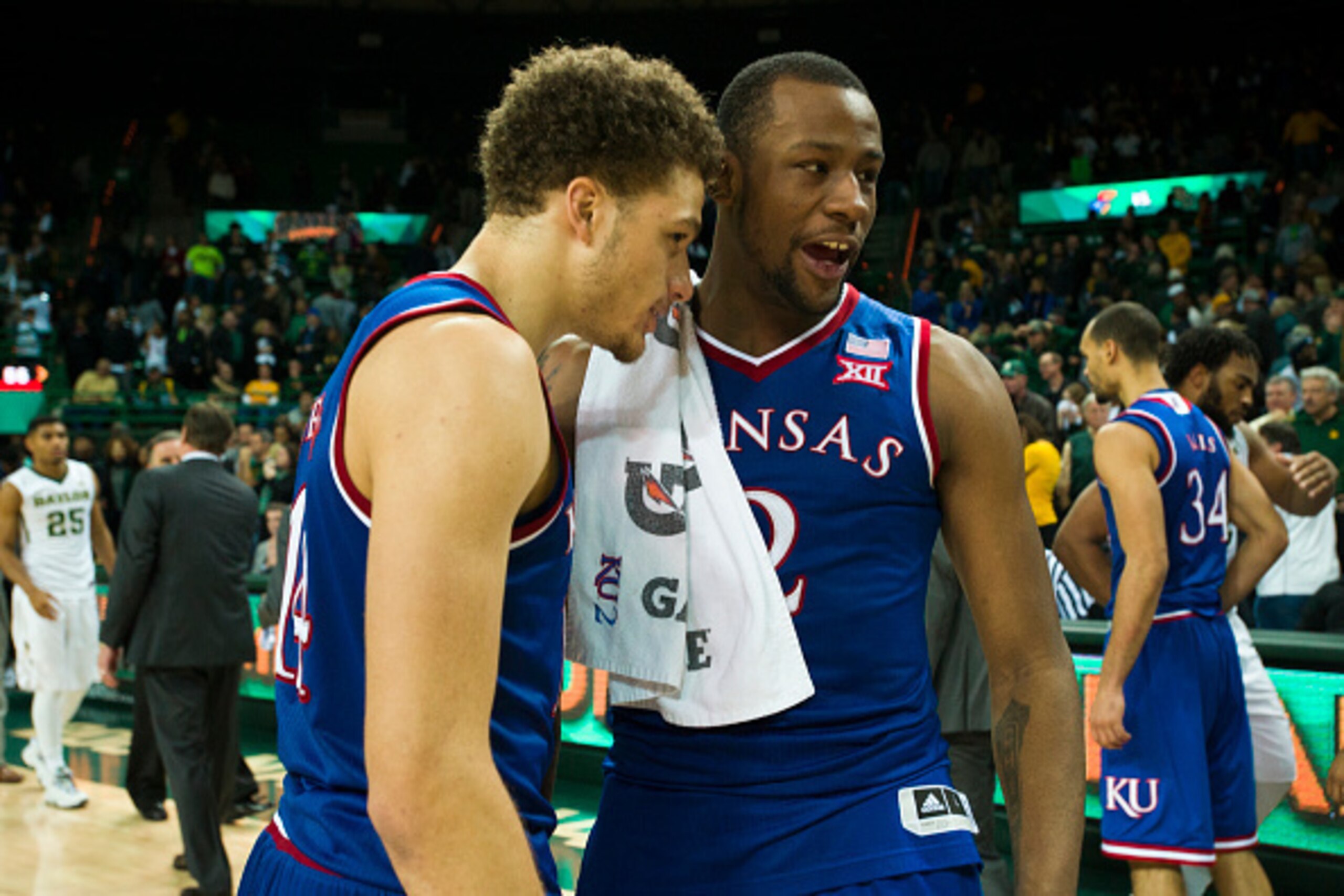 WACO, TX - JANUARY 7: Brannen Greene #14 (left) and Cliff Alexander #2 (right) of the Kansas Jayhawks celebrate after defeating the Baylor Bears on January 7, 2015 at the Ferrell Center in Waco, Texas.  (Photo by Cooper Neill/Getty Images)