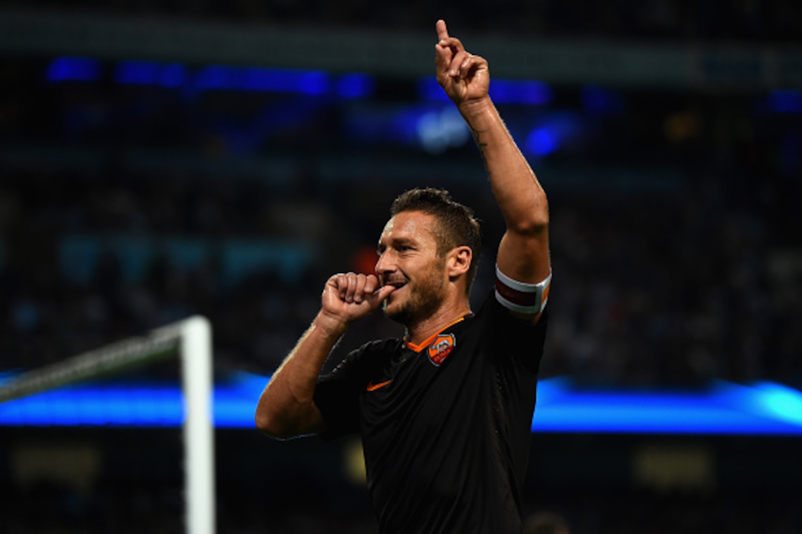 MANCHESTER, ENGLAND - SEPTEMBER 30:  Francesco Totti of AS Roma celebrates scoring his team's first goal during the UEFA Champions League Group E match between Manchester City FC and AS Roma  on September 30, 2014 in Manchester, United Kingdom.  (Photo by