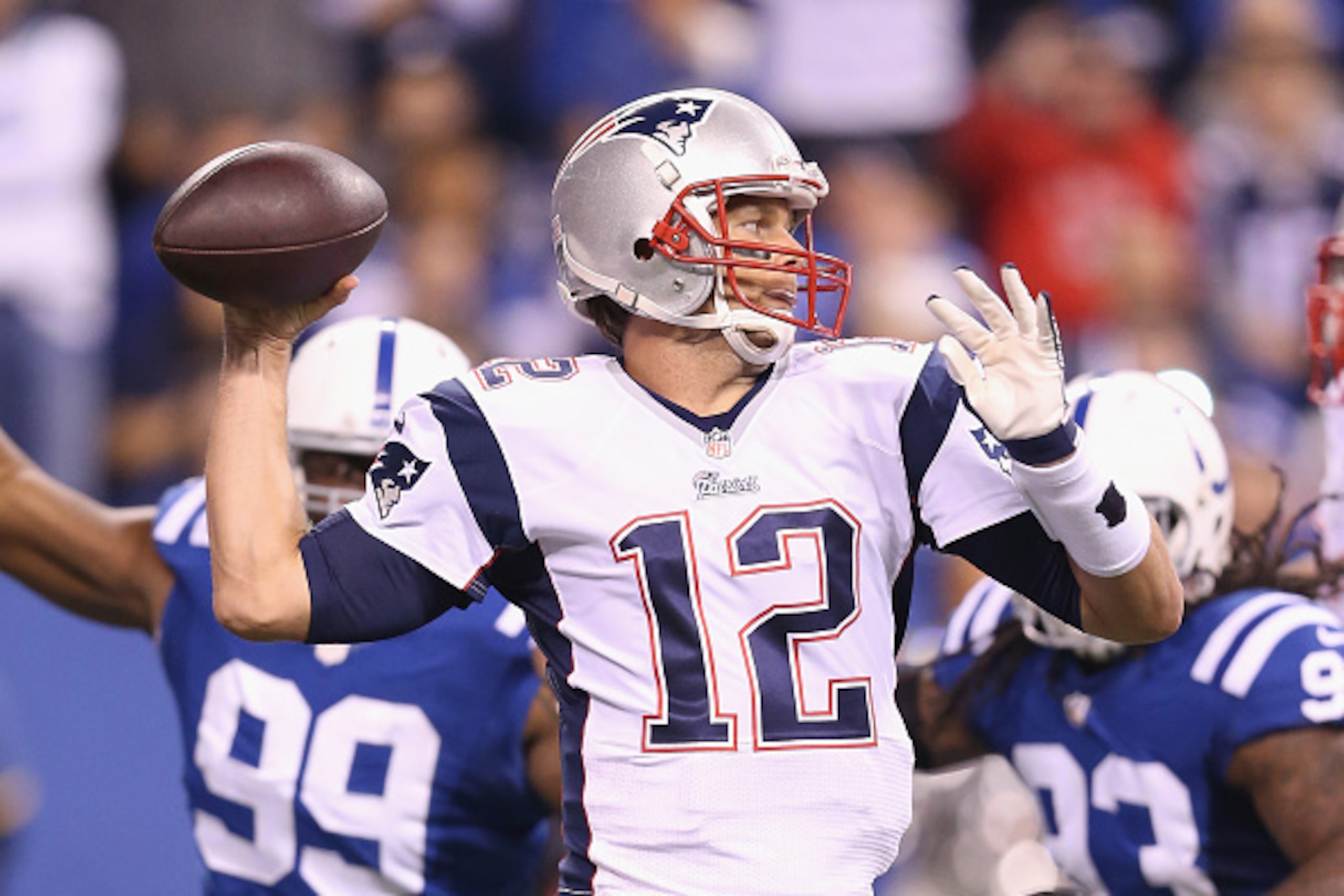 INDIANAPOLIS, IN - NOVEMBER 16:  Tom Brady #12 of the New England Patriots throws a pass during the game against the Indianapolis Colts at Lucas Oil Stadium on November 16, 2014 in Indianapolis, Indiana.  (Photo by Andy Lyons/Getty Images)