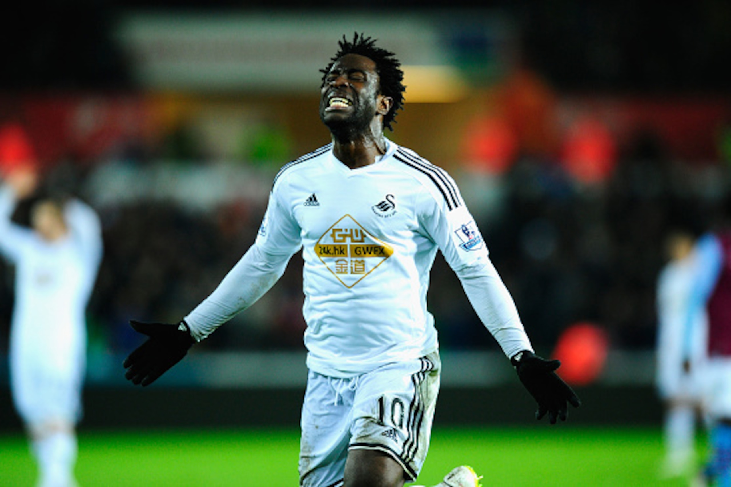 SWANSEA, WALES - DECEMBER 26:  Wilfried Bony of Swansea reacts after having a goal dissalowed during the Barclays Premier League match between Swansea City and Aston Villa at Liberty Stadium on December 26, 2014 in Swansea, Wales.  (Photo by Stu Forster/G