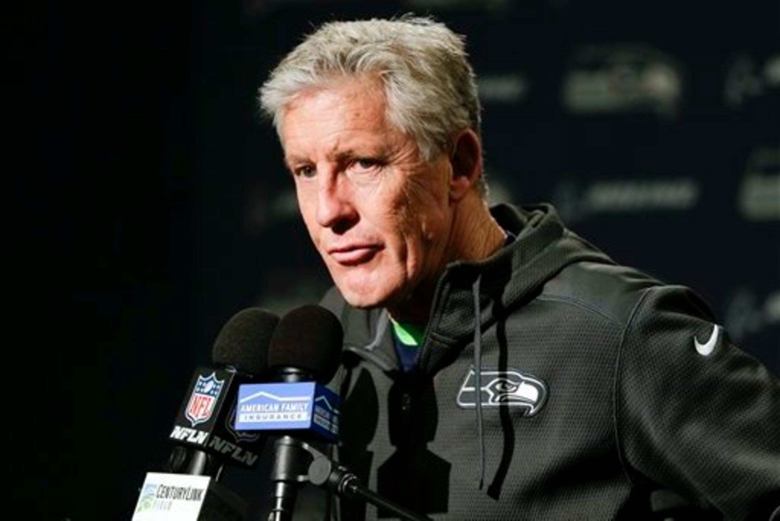 Is Pete Carroll an ex-college coach or an ex-NFL head coach?