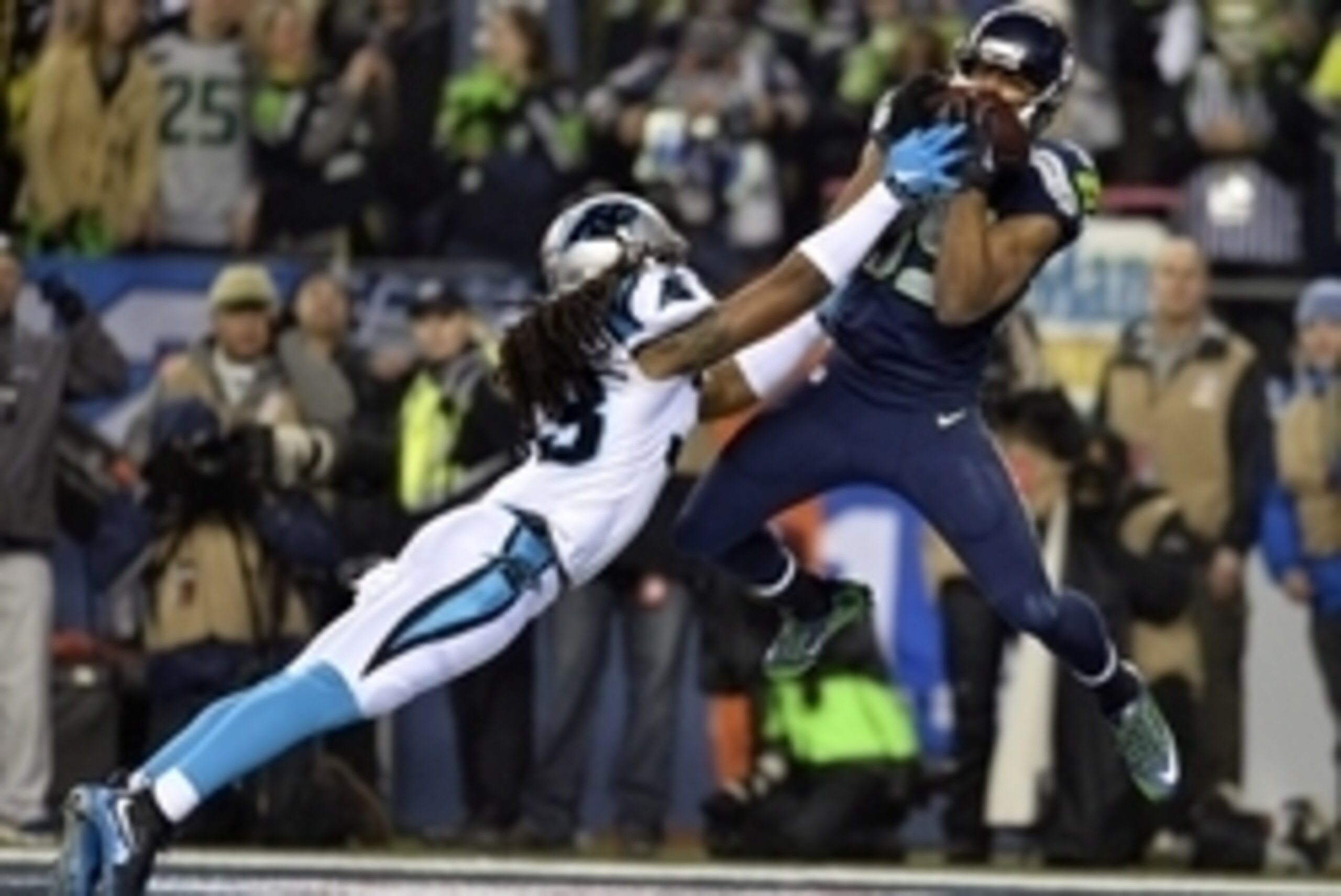 January 10, 2015; Seattle, WA, USA; Seattle Seahawks wide receiver Doug Baldwin (89) catches a touchdown pass against the Carolina Panthers during the first half in the 2014 NFC Divisional playoff football game at CenturyLink Field. Mandatory Credit: Stev