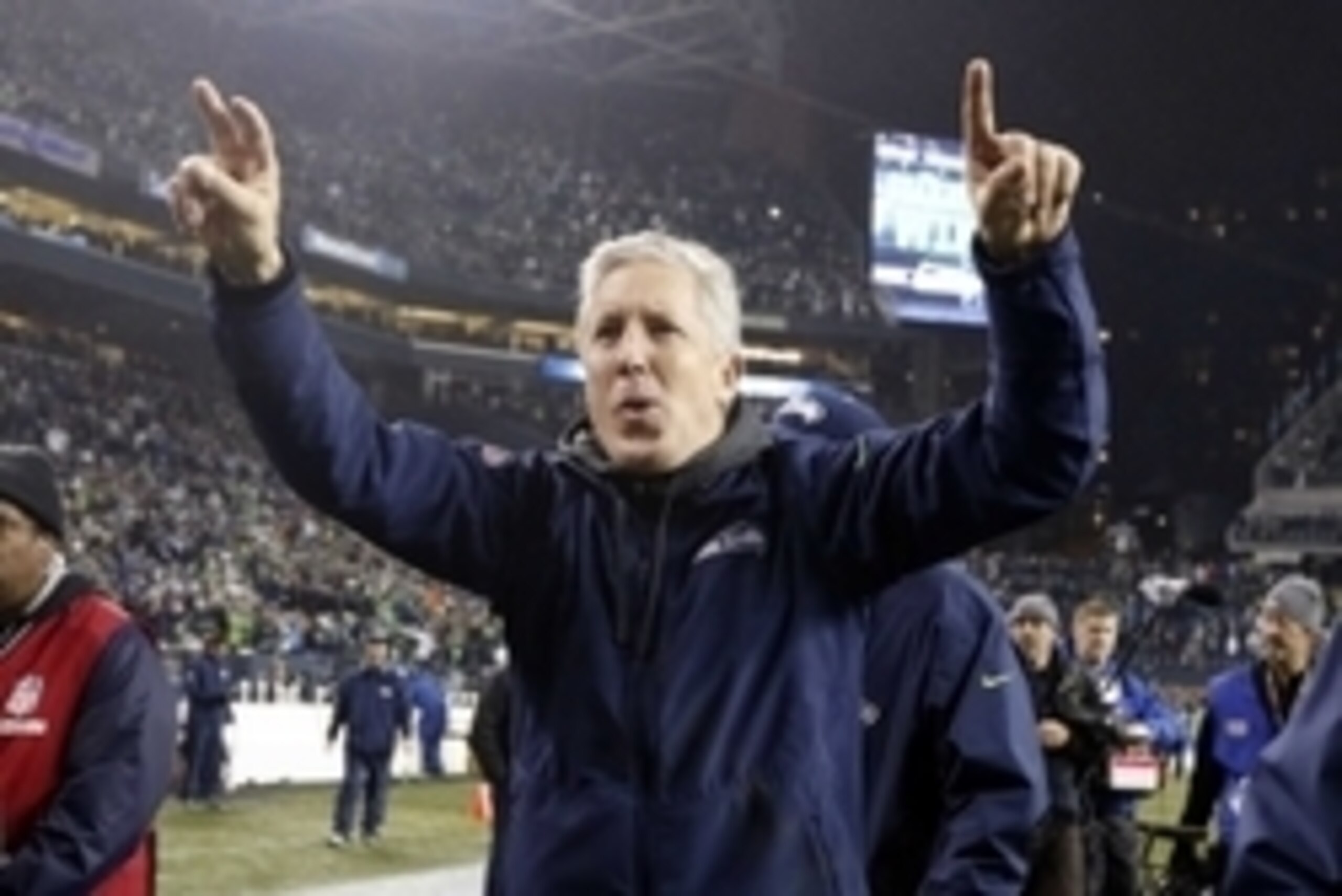 January 10, 2015; Seattle, WA, USA; Seattle Seahawks head coach Pete Carroll celebrates the 31-17 victory against the Carolina Panthers following the second half in the 2014 NFC Divisional playoff football game at CenturyLink Field. Mandatory Credit: Joe 