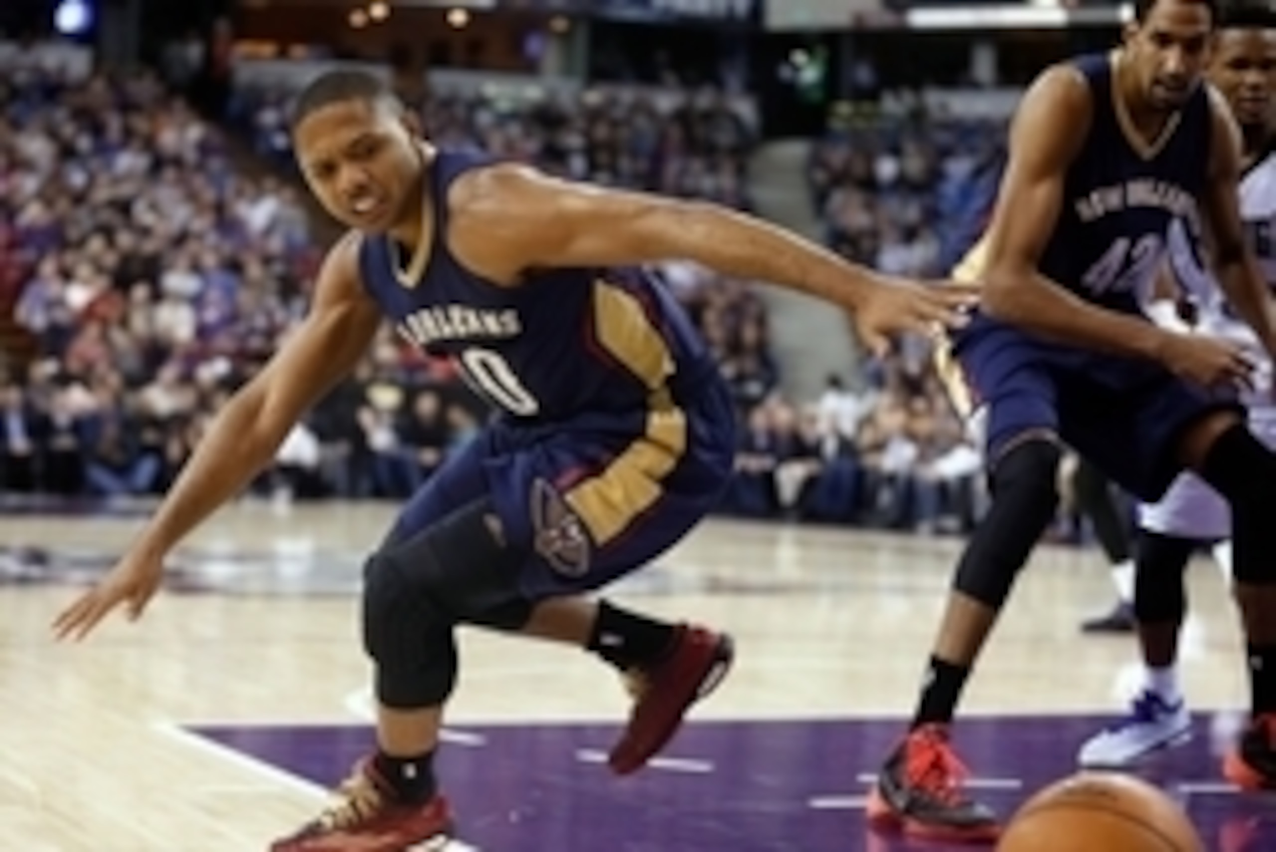 Nov 18, 2014; Sacramento, CA, USA; New Orleans Pelicans guard Eric Gordon (10) is unable to control the loose ball against the Sacramento Kings during the first quarter at Sleep Train Arena. Mandatory Credit: Kelley L Cox-USA TODAY Sports
