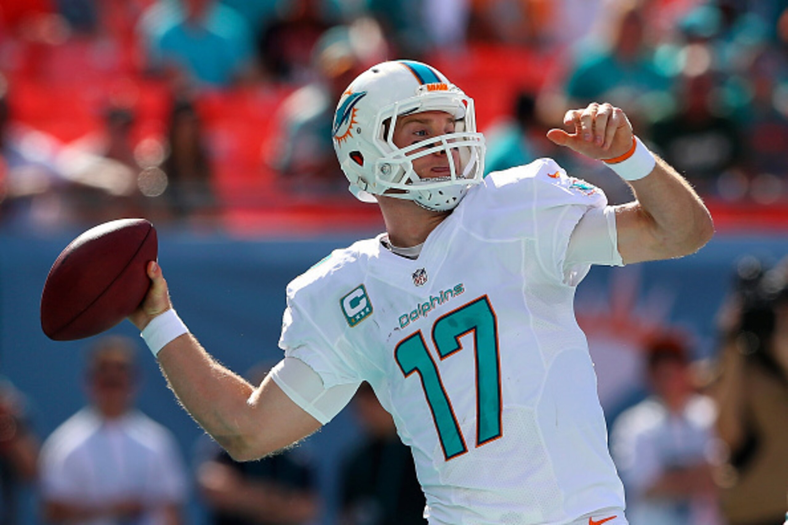 MIAMI GARDENS, FL - DECEMBER 28: Quarterback Ryan Tannehill #17 of the Miami Dolphins throws in the first quarter during a game against the New York Jets at Sun Life Stadium on December 28, 2014 in Miami Gardens, Florida.  (Photo by Mike Ehrmann/Getty Ima