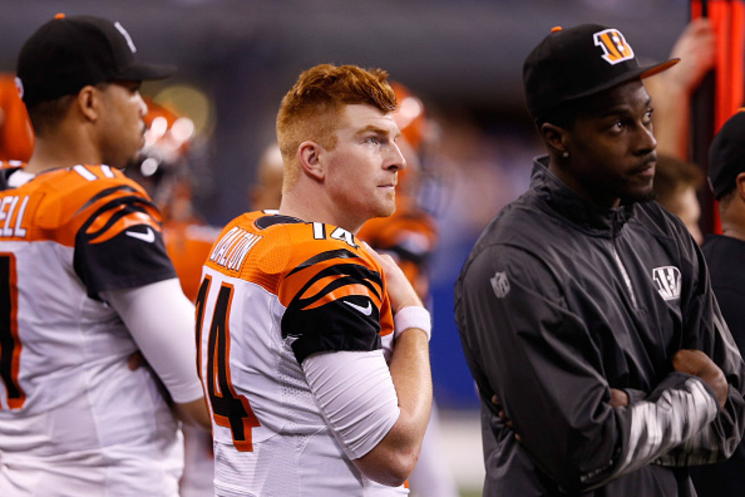 INDIANAPOLIS, IN - JANUARY 04:  Andy Dalton #14 of the Cincinnati Bengals watches the final seconds tick off the clock in the bengals loss to the Indianapolis Colts during their AFC Wild Card game at Lucas Oil Stadium on January 4, 2015 in Indianapolis, I