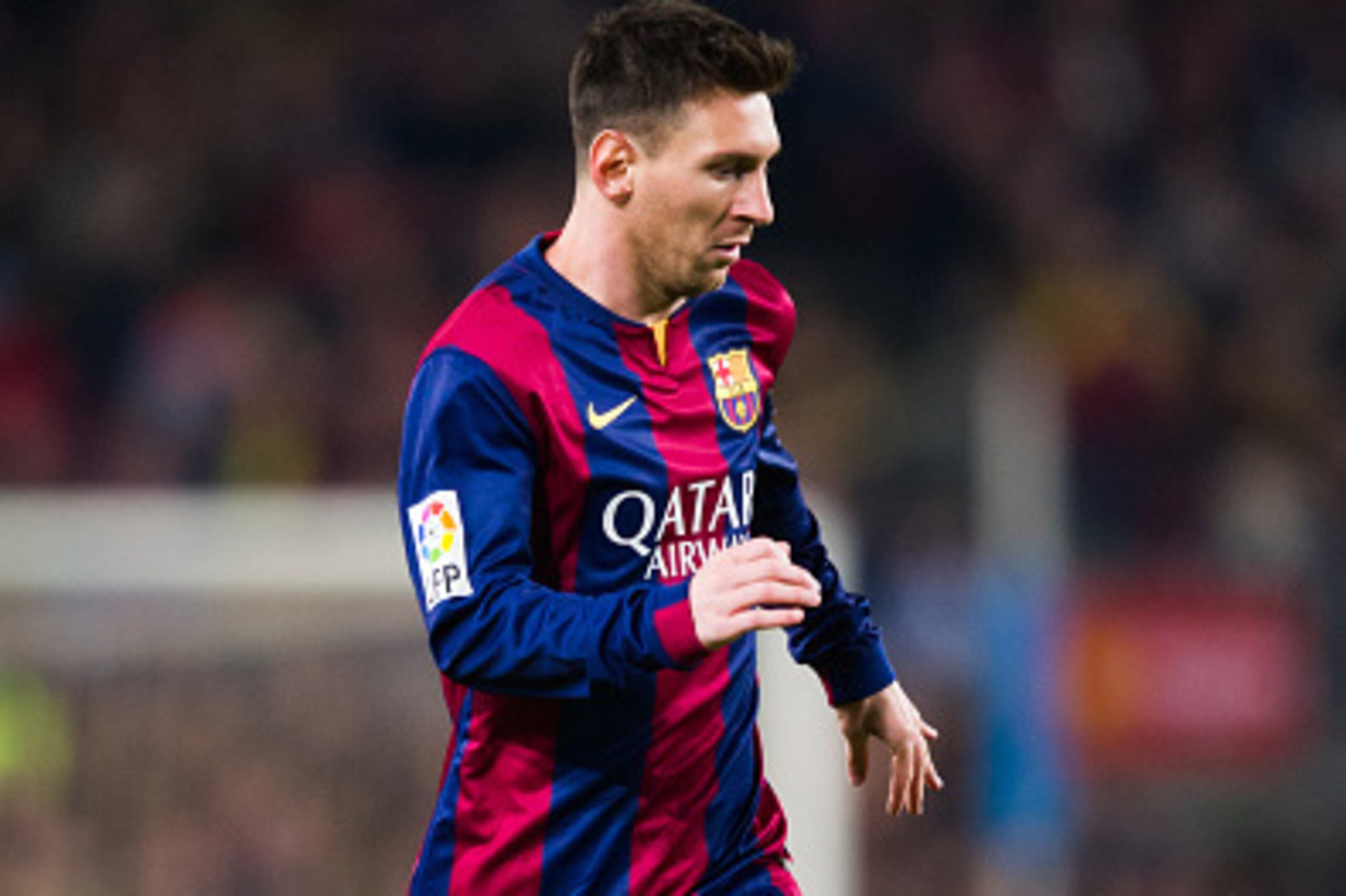 BARCELONA, SPAIN - JANUARY 11: Lionel Messi of FC Barcelona runs with the ball during the La Liga match between FC Barcelona and Club Atletico de Madrid at Camp Nou on January 11, 2015 in Barcelona, Spain. (Photo by Alex Caparros/Getty Images)