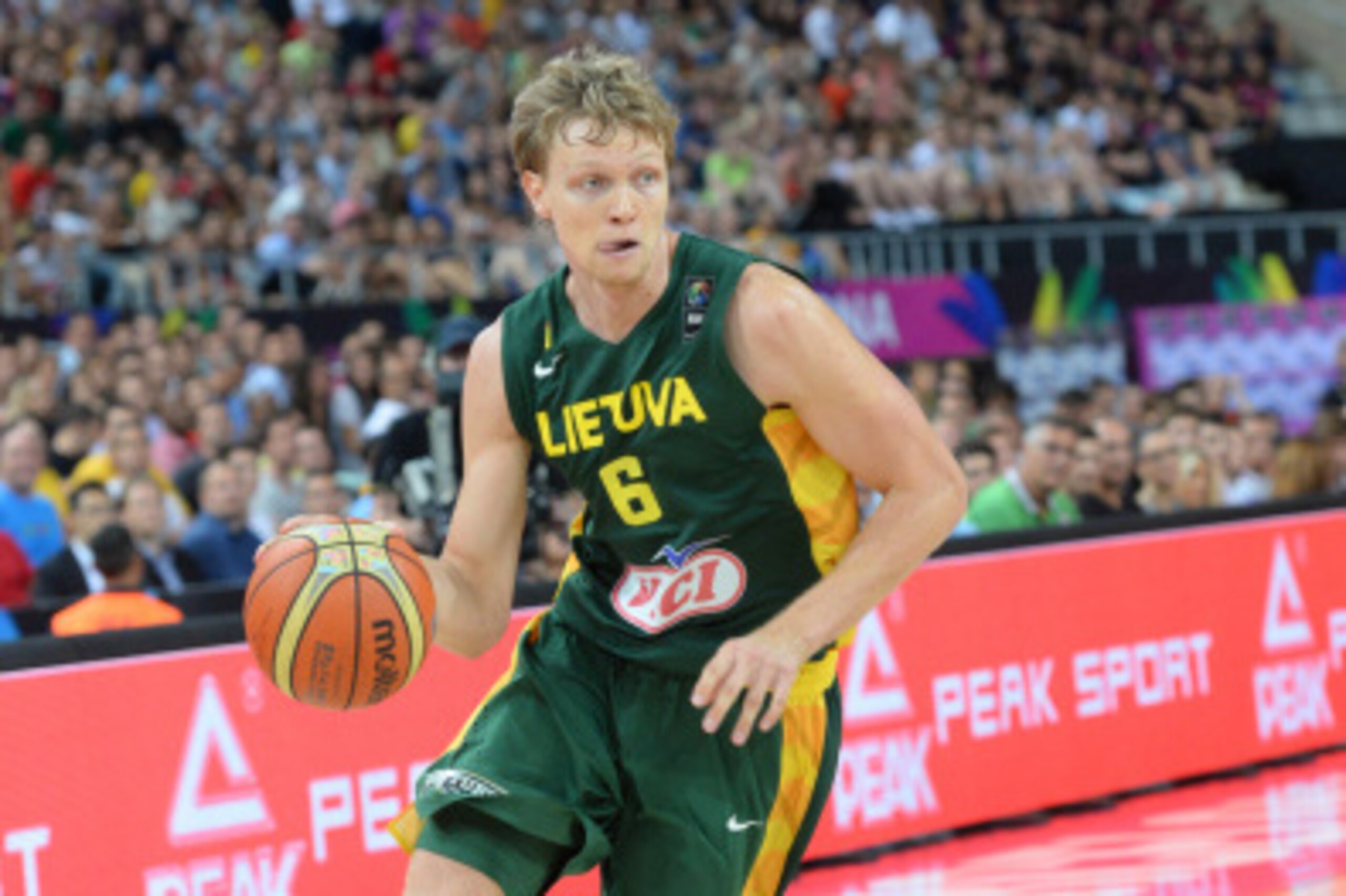 BARCELONA, SPAIN - SEPTEMBER 11: Mindaugas Kuzminskas #6 of the Lithuania National Team drives against the USA Basketball Men's National Team during the 2014 FIBA World Cup Semi-Finals at Palau Sant Jordi on September 11, 2014 in Barcelona, Spain. NOTE BARCELONA, SPAIN - SEPTEMBER 11: Mindaugas Kuzminskas #6 of the Lithuania National Team drives against the USA Basketball Men's National Team during the 2014 FIBA World Cup Semi-Finals at Palau Sant Jordi on September 11, 2014 in Barcelona, Spain. NOTE