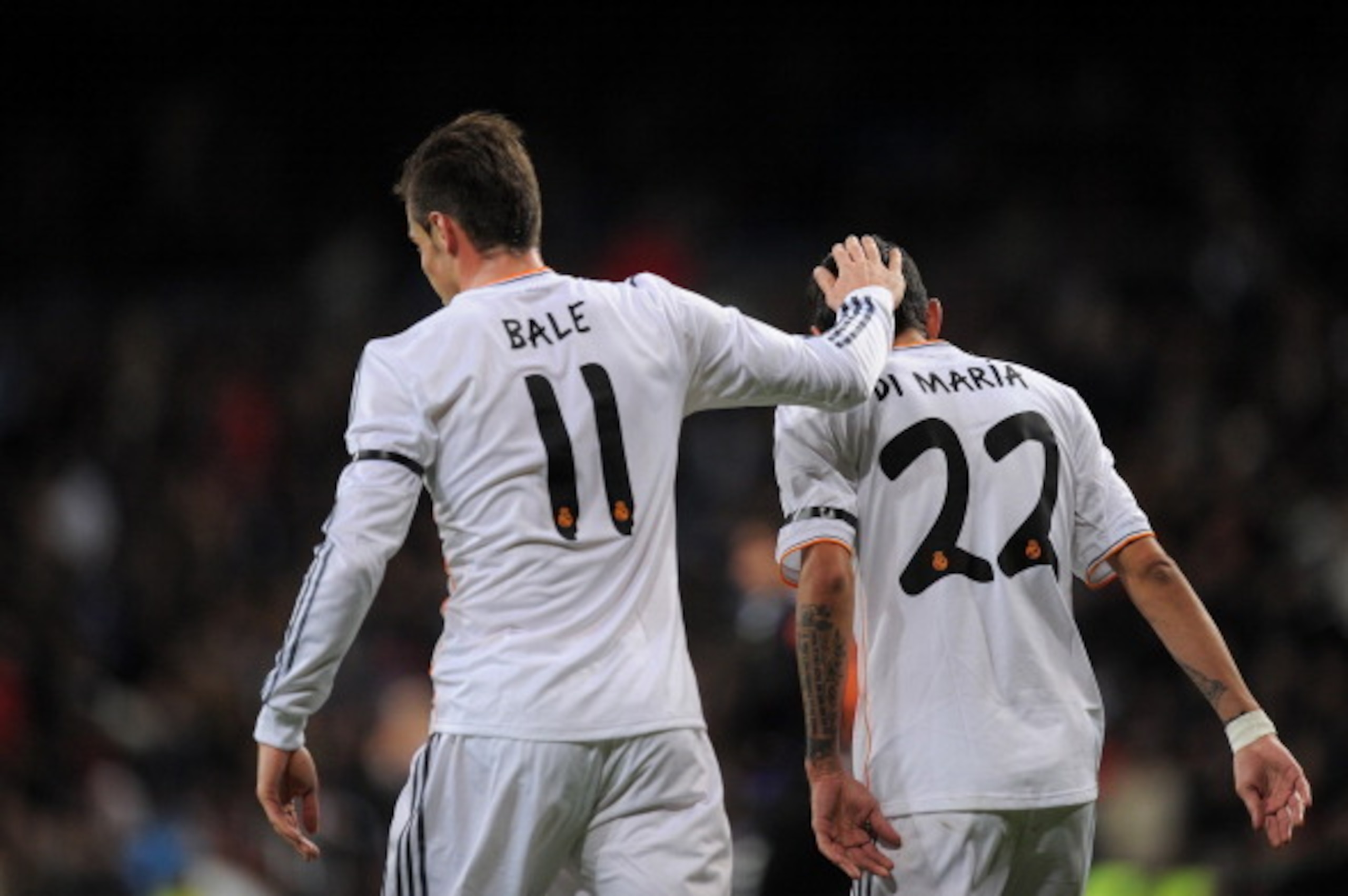 MADRID, SPAIN - NOVEMBER 30: Gareth Bale of Real Madrid CF celebrates with Angel Di Maria after scoring Real's opening goal during the La Liga match between Real Madrid CF and Real Valladolid CF at Santiago Bernabeu stadium on November 30, 2013 in Madrid MADRID, SPAIN - NOVEMBER 30: Gareth Bale of Real Madrid CF celebrates with Angel Di Maria after scoring Real's opening goal during the La Liga match between Real Madrid CF and Real Valladolid CF at Santiago Bernabeu stadium on November 30, 2013 in Madrid