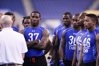 INDIANAPOLIS, IN - MARCH 1: Defensive back Patrick Peterson #37 of LSU looks on while standing with a group of other players during the 2011 NFL Scouting Combine at Lucas Oil Stadium on February 28, 2011 in Indianapolis, Indiana. (Photo by Joe Robbins/Get