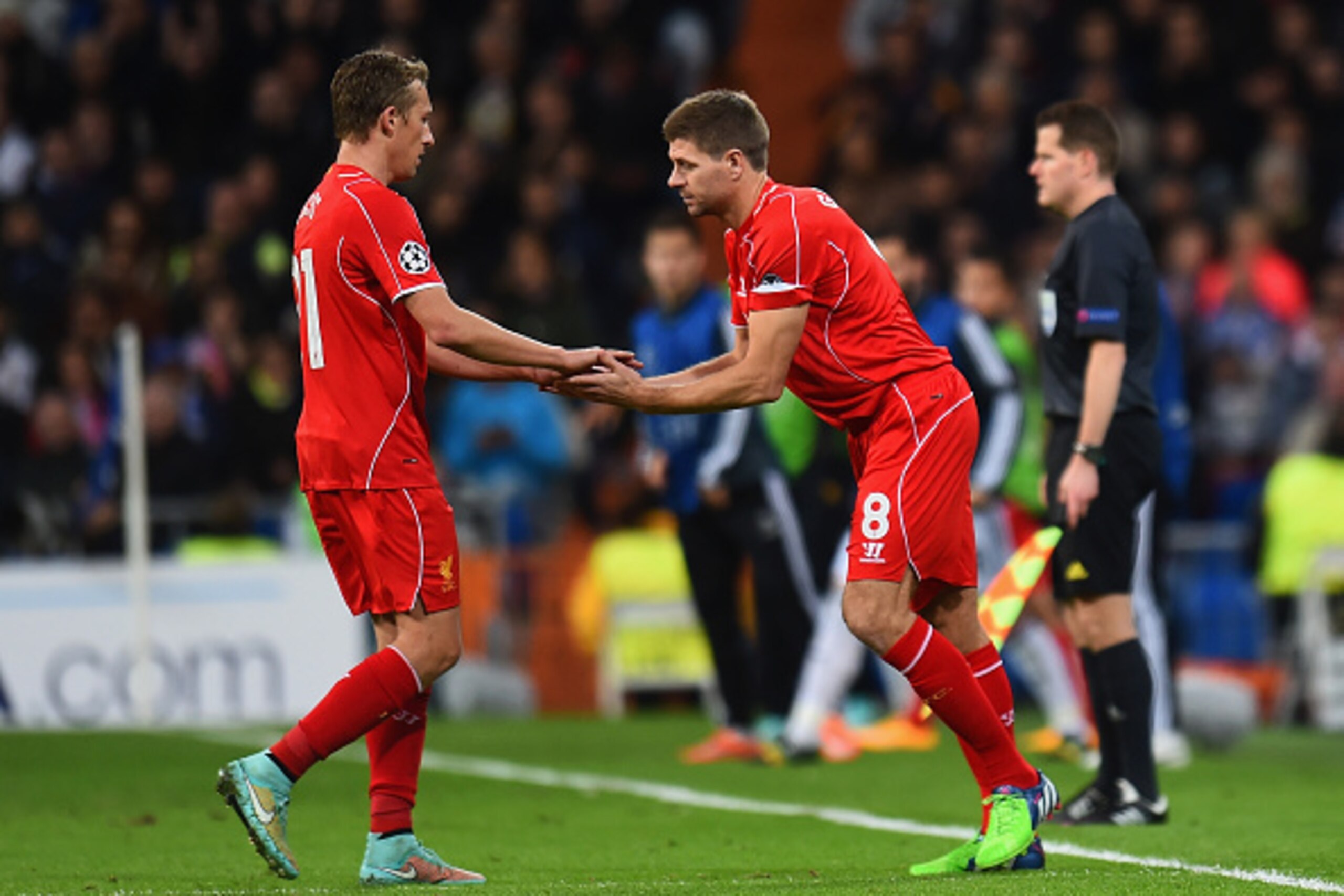 MADRID, SPAIN - NOVEMBER 04: Steven Gerrard of Liverpool replaces Lucas Leiva of Liverpool during the UEFA Champions League Group B match between Real Madrid CF and Liverpool FC at Estadio Santiago Bernabeu on November 4, 2014 in Madrid, Spain.  (Photo by