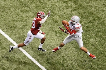 NEW ORLEANS, LA - JANUARY 01:  Devin Smith #9 of the Ohio State Buckeyes completes a reception against the Alabama Crimson Tide during the All State Sugar Bowl at the Mercedes-Benz Superdome on January 1, 2015 in New Orleans, Louisiana.  (Photo by Stacy R