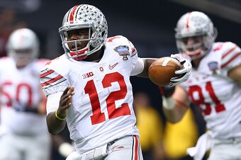 NEW ORLEANS, LA - JANUARY 01:  Cardale Jones #12 of the Ohio State Buckeyes in action in the first half against the Alabama Crimson Tide during the All State Sugar Bowl at the Mercedes-Benz Superdome on January 1, 2015 in New Orleans, Louisiana.  (Photo b