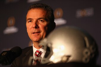 DALLAS, TX - JANUARY 11:  Head coach Urban Meyer of the Ohio State Buckeyes speaks with the media during a Head Coaches press conference at the Renaissance Dallas Hotel on January 11, 2015 in Dallas, Texas.  (Photo by Ronald Martinez/Getty Images)
