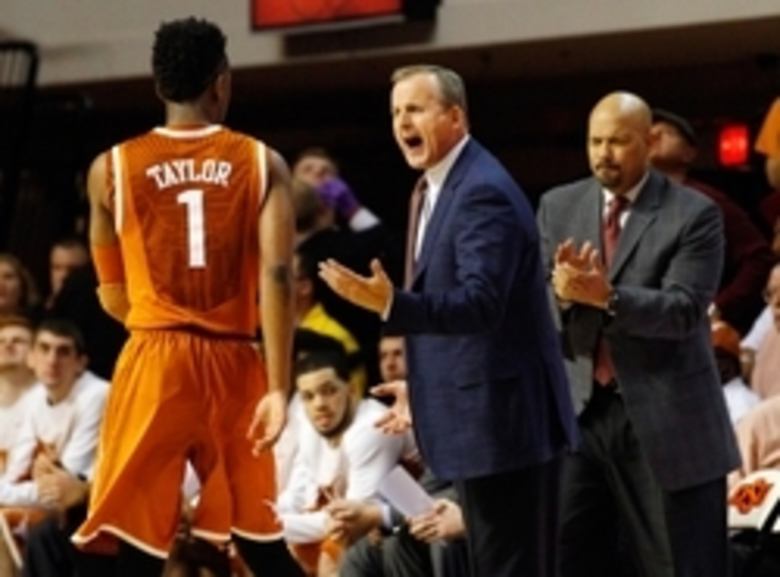 Jan 10, 2015; Stillwater, OK, USA; Texas Longhorns head coach Rick Barnes talks to Texas Longhorns guard Isaiah Taylor (1) against the Oklahoma State Cowboys during the second half at Gallagher-Iba Arena. Oklahoma State won 69-58. Mandatory Credit: Ray Ca