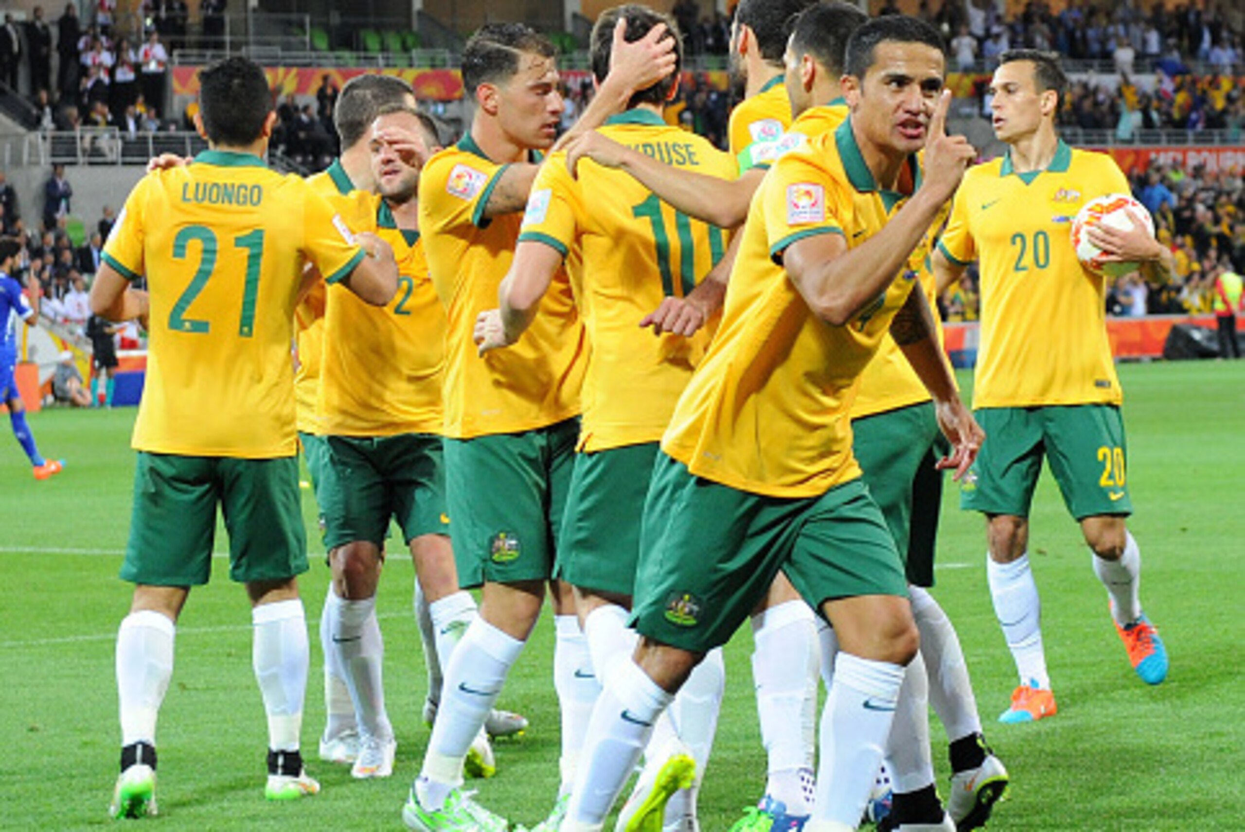 MELBOURNE, AUSTRALIA - JANUARY 09: Tim Cahill of Australia celebrates with teammates after scoring his first goal in the first half during the 2015 Asian Cup match between the Australian Socceroos and Kuwait at AAMI Park on January 9, 2015 in Melbourne, MELBOURNE, AUSTRALIA - JANUARY 09: Tim Cahill of Australia celebrates with teammates after scoring his first goal in the first half during the 2015 Asian Cup match between the Australian Socceroos and Kuwait at AAMI Park on January 9, 2015 in Melbourne,