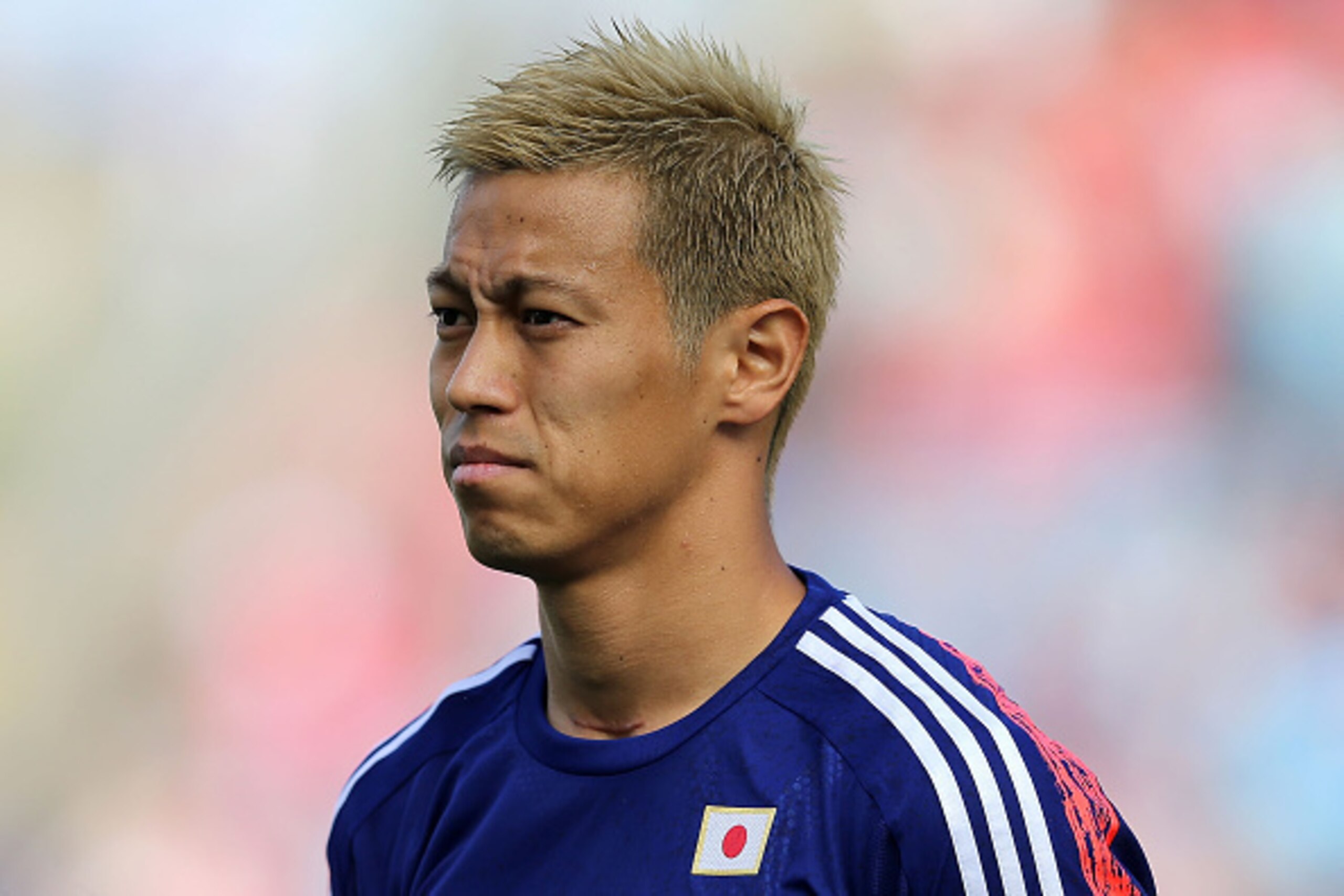 NEWCASTLE, AUSTRALIA - JANUARY 12: Keisuke Honda of Japan looks on during the 2015 Asian Cup match between Japan and Palestine at Hunter Stadium on January 12, 2015 in Newcastle, Australia. (Photo by Ashley Feder/Getty Images) NEWCASTLE, AUSTRALIA - JANUARY 12: Keisuke Honda of Japan looks on during the 2015 Asian Cup match between Japan and Palestine at Hunter Stadium on January 12, 2015 in Newcastle, Australia. (Photo by Ashley Feder/Getty Images)