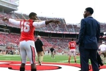 Sep 6, 2014; Columbus, OH, USA; Ohio State Buckeyes quarterback J.T. Barrett (16) talks with Braxton Miller on the field prior to the game against the Virginia Tech Hokies at Ohio Stadium. Mandatory Credit: Andrew Weber-USA TODAY Sports