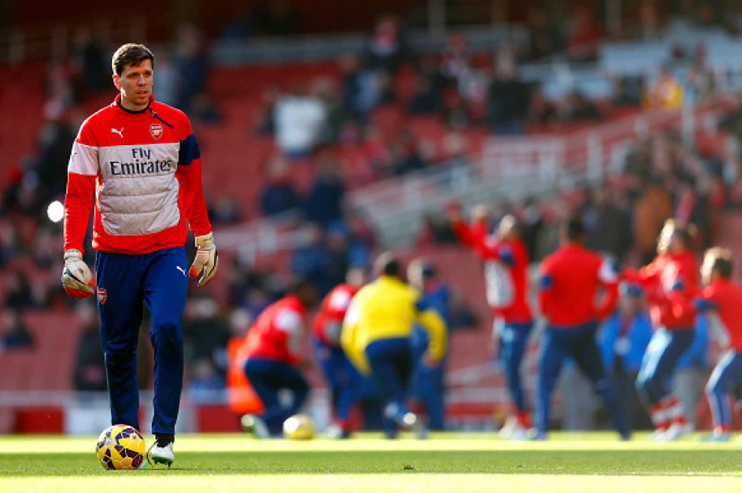 LONDON, ENGLAND - JANUARY 11:  Wojciech Szczesny of Arsenal takes part in the warm-up before the Barclays Premier League match between Arsenal and Stoke City at Emirates Stadium on January 11, 2015 in London, England.  (Photo by Julian Finney/Getty Images