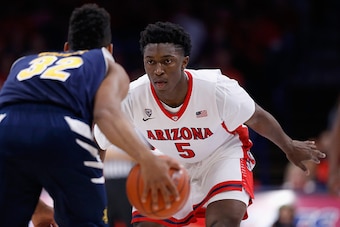 TUCSON, AZ - NOVEMBER 19:  Stanley Johnson #5 of the Arizona Wildcats on defense during the college basketball game against the UC Irvine Anteaters at McKale Center on November 19, 2014 in Tucson, Arizona. The Wildcats defeated the Anteaters 71-54.  (Phot