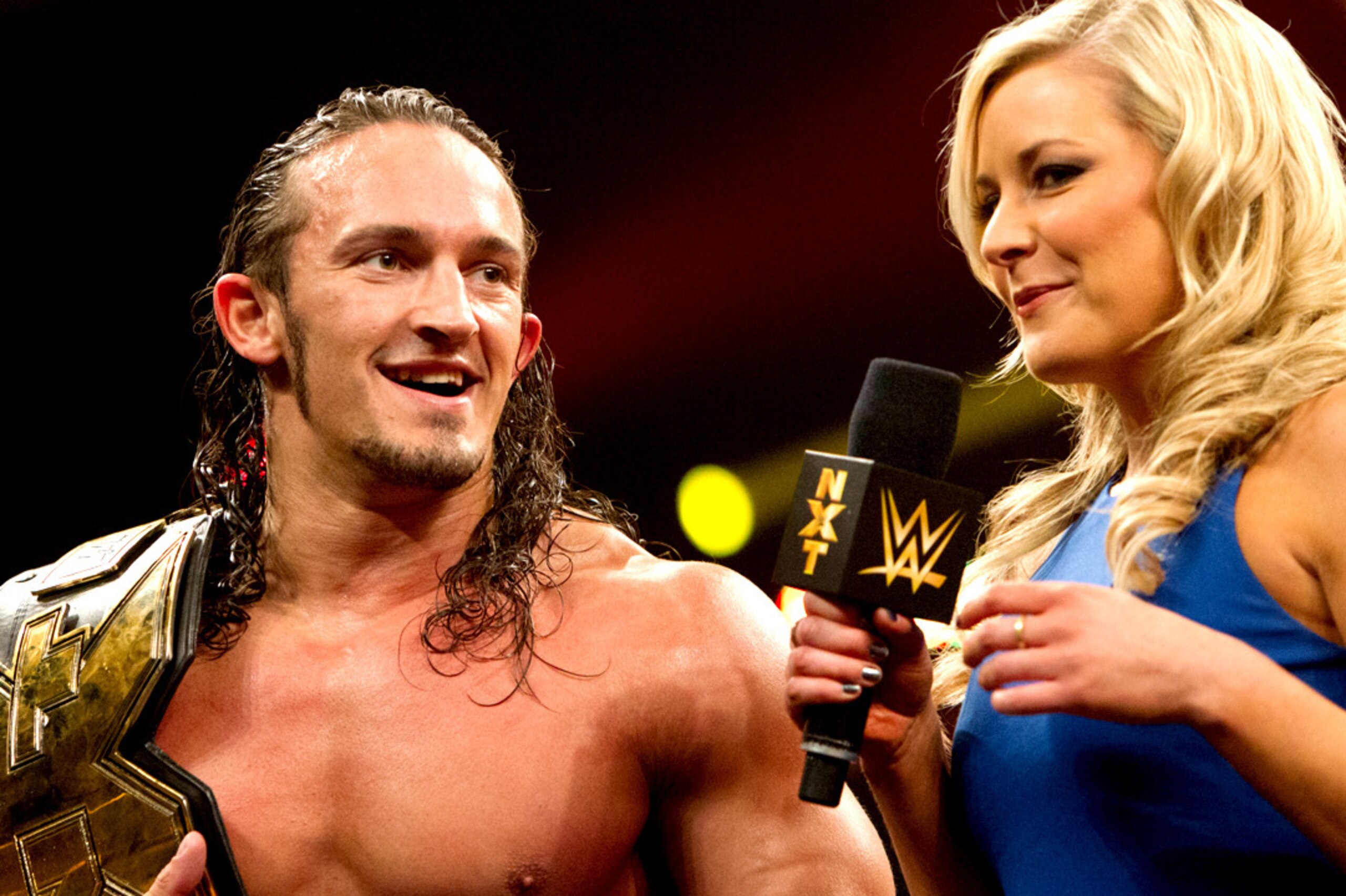 Adrian Neville with Renee Young