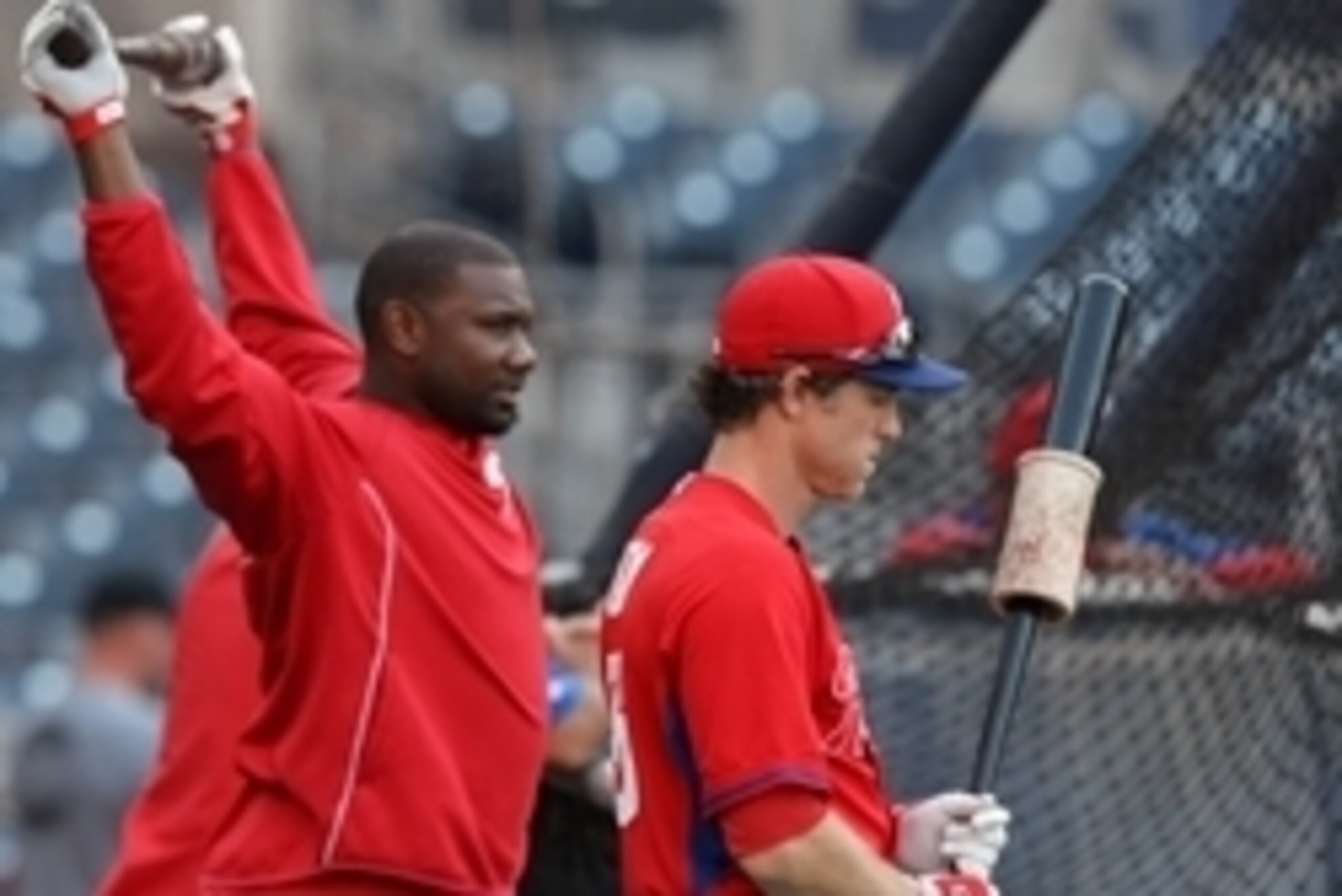 Sep 15, 2014; San Diego, CA, USA; Philadelphia Phillies second baseman Chase Utley (right) and first baseman Ryan Howard (left) during batting practice before the game against the San Diego Padres at Petco Park. Mandatory Credit: Jake Roth-USA TODAY Sport