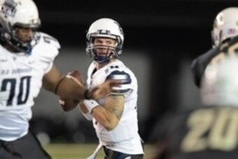 Nov 1, 2014; Nashville, TN, USA; Old Dominion Monarchs quarterback Taylor Heinicke (14) drops back to pass during the second half against the Vanderbilt Commodores at Vanderbilt Stadium. Mandatory Credit: Christopher Hanewinckel-USA TODAY Sports