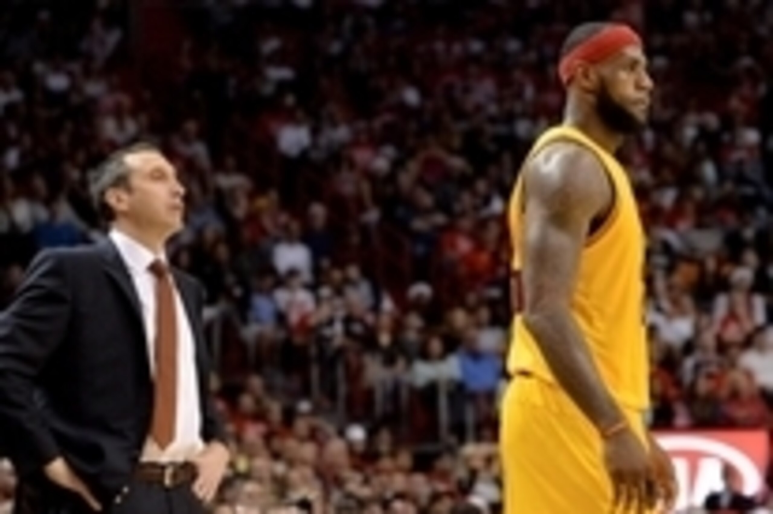 Dec 25, 2014; Miami, FL, USA; Cleveland Cavaliers head coach David Blatt (left) looks over at Cleveland Cavaliers forward LeBron James (right) during the first half against Miami Heat at American Airlines Arena. Mandatory Credit: Steve Mitchell-USA TODAY 