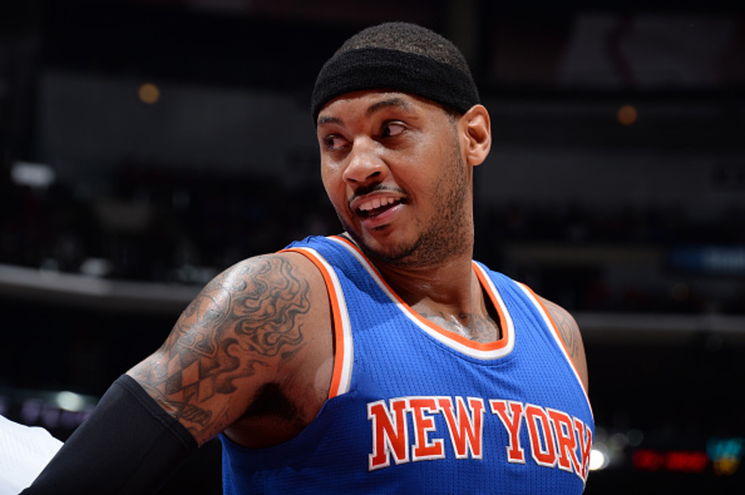 LOS ANGELES, CA - DECEMBER 31: Carmelo Anthony #7 of the New York Knicks smiles during a game against the Los Angeles Clippers during the game on December 31, 2014 at STAPLES Center in Los Angeles, California. NOTE TO USER: User expressly acknowledges and