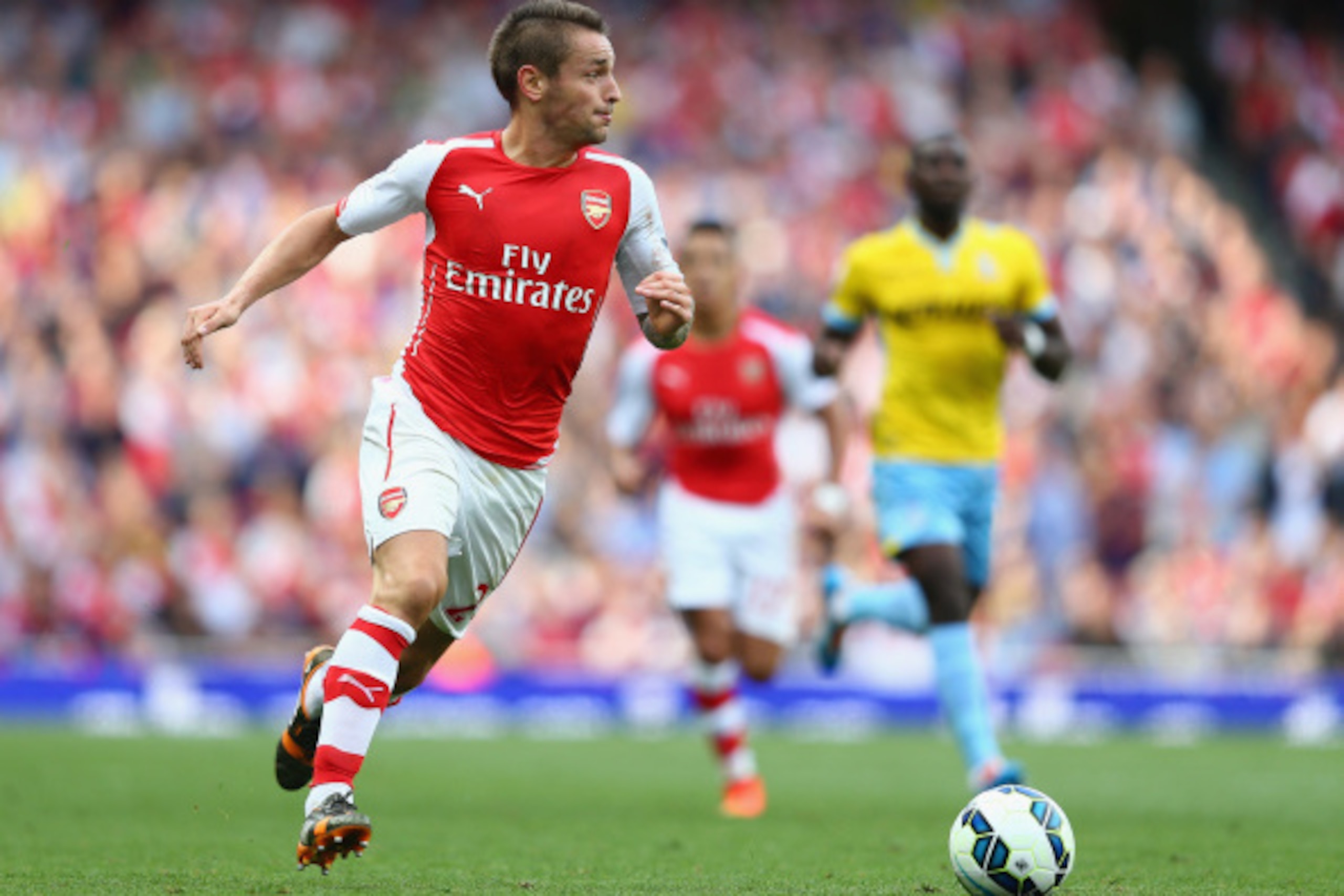 LONDON, ENGLAND - AUGUST 16:  Mathieu Debuchy of Arsenal in action during the Barclays Premier League match between Arsenal and Crystal Palace at Emirates Stadium on August 16, 2014 in London, England.  (Photo by Clive Mason/Getty Images)