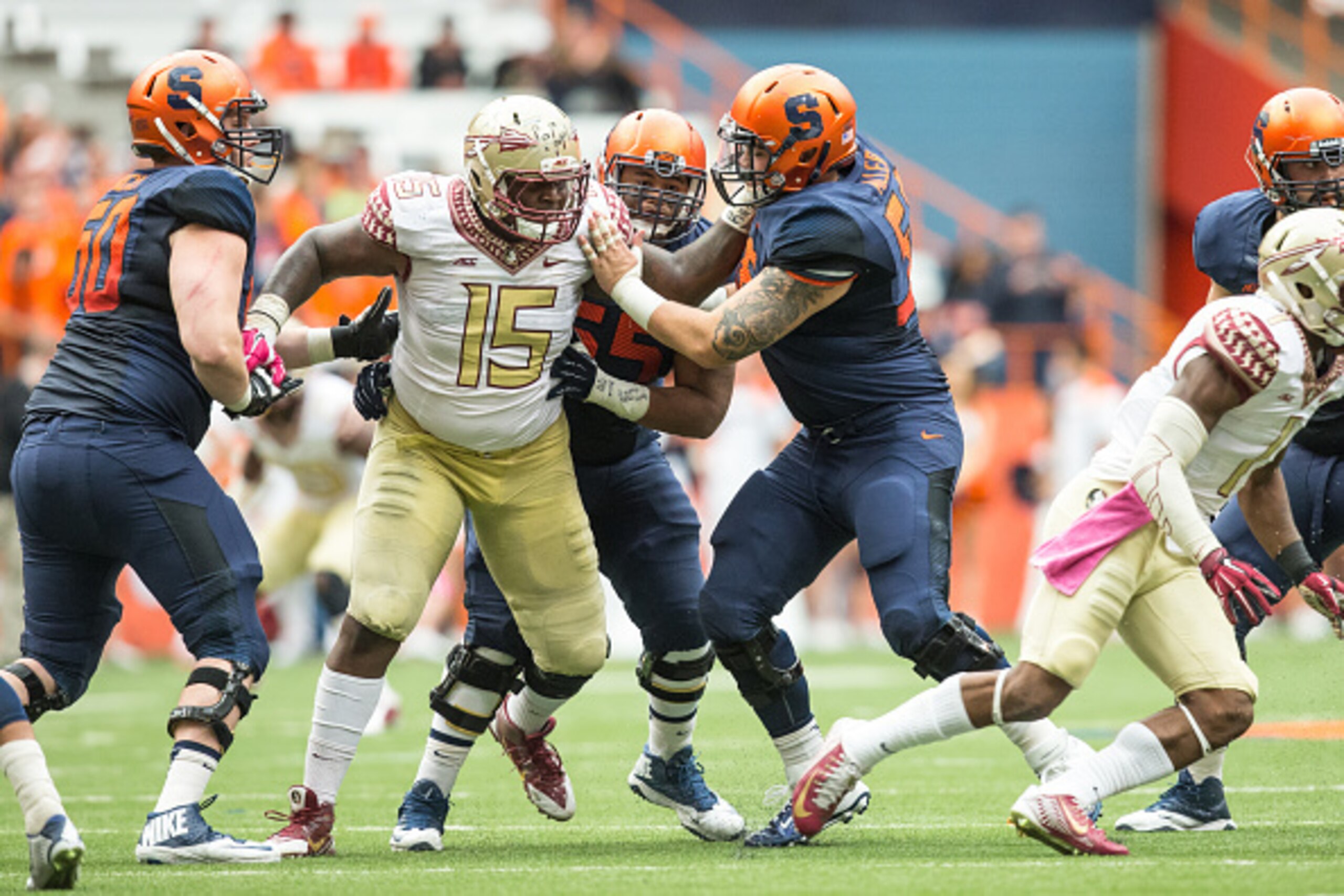 SYRACUSE, NY - OCTOBER 11:  Mario Edwards Jr. #15 of the Florida State Seminoles pushes through Syracuse Orange offensive line on October 11, 2014 at The Carrier Dome in Syracuse, New York.  Florida State Seminoles defeat Syracuse Orange 38-20.  (Photo by