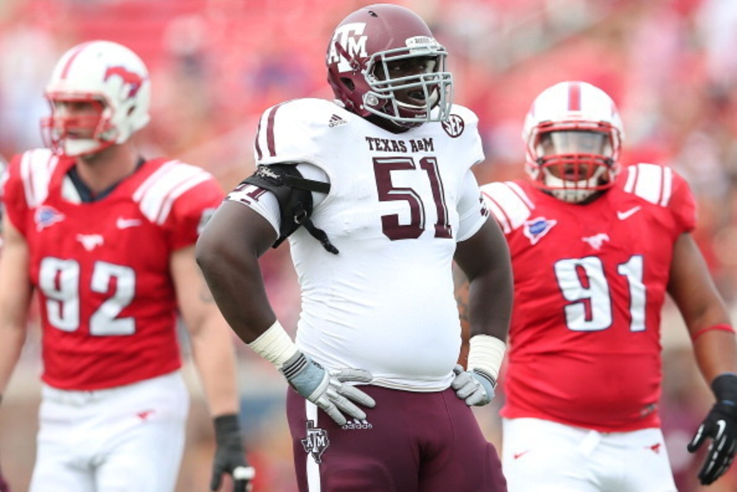 DALLAS, TX - SEPTEMBER 15:  Jarvis Harrison #51 of the Texas A&M Aggies at Gerald J. Ford Stadium on September 15, 2012 in Dallas, Texas.  (Photo by Ronald Martinez/Getty Images)