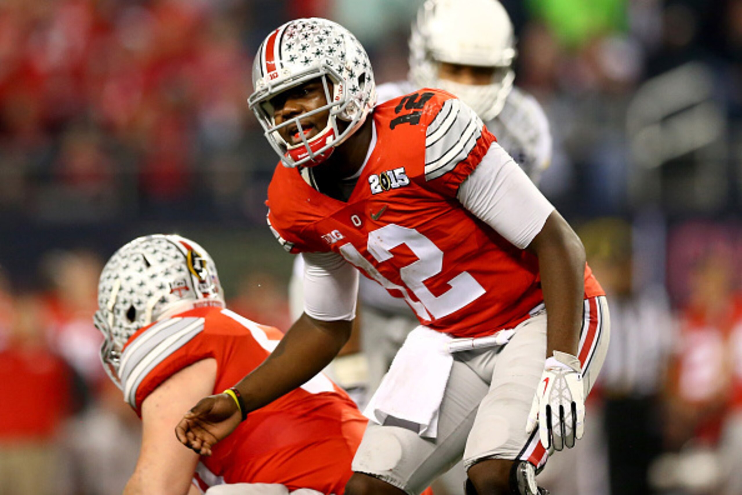 ARLINGTON, TX - JANUARY 12: Quarterback Cardale Jones #12 of the Ohio State Buckeyes looks on against the Oregon Ducks during the College Football Playoff National Championship Game at AT&T Stadium on January 12, 2015 in Arlington, Texas.  (Photo by Ronal