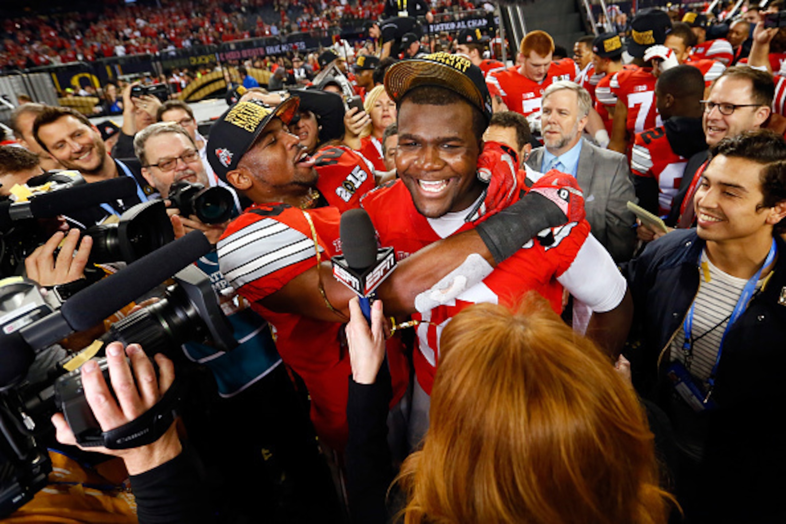 ARLINGTON, TX - JANUARY 12:  Quarterback Cardale Jones #12 of the Ohio State Buckeyes celebrates after defeating the Oregon Ducks 42 to 20 in the College Football Playoff National Championship Game at AT&T Stadium on January 12, 2015 in Arlington, Texas. 
