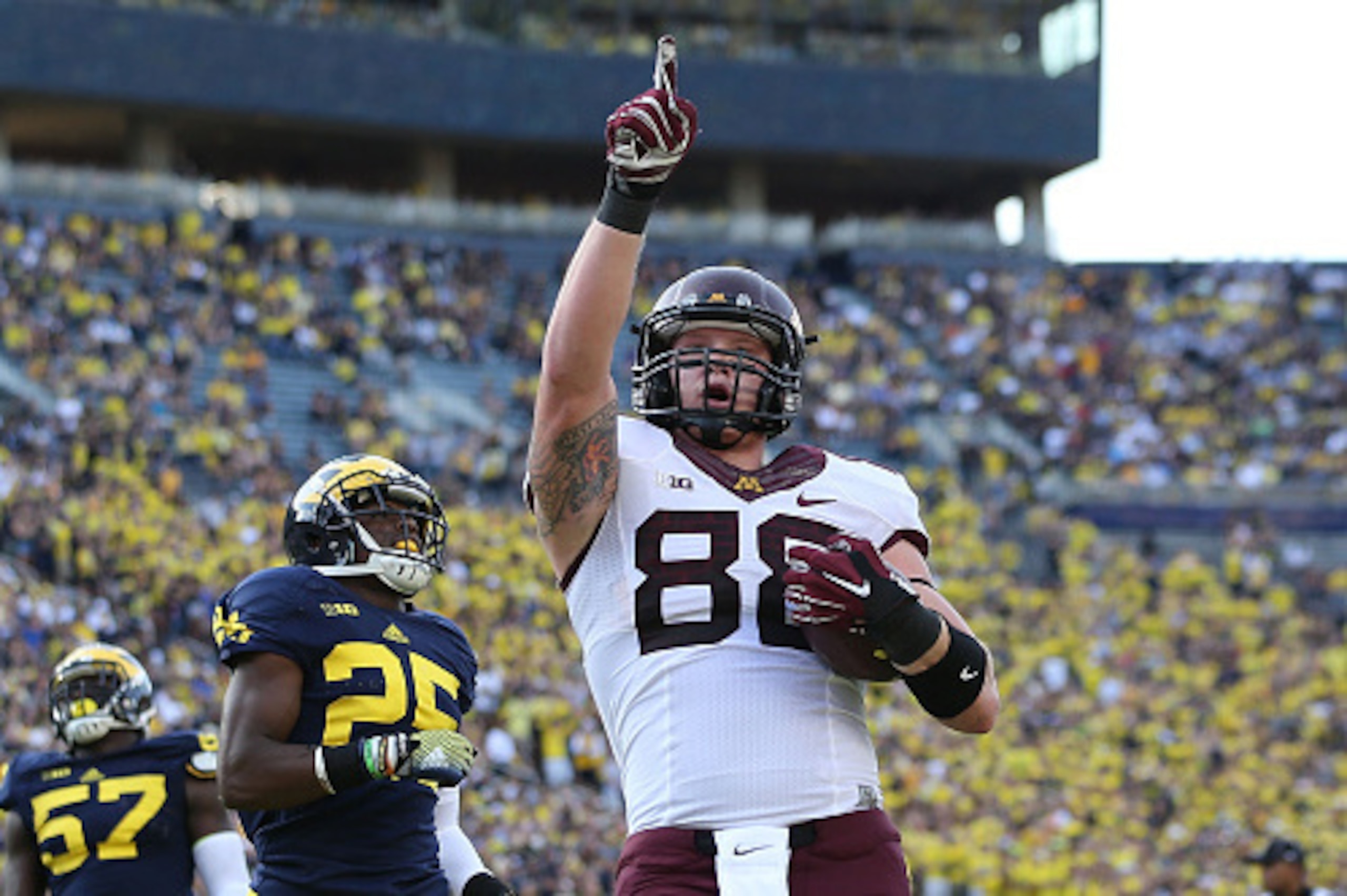 ANN ARBOR, MI - SEPTEMBER 27: Maxx Williams #88 of the Minnesota Golden Gophers celebrates after scoring a one yard touchdown during the third quarter of the game against the Michigan Wolverines at Michigan Stadium on September 27, 2014 in Ann Arbor, Mich