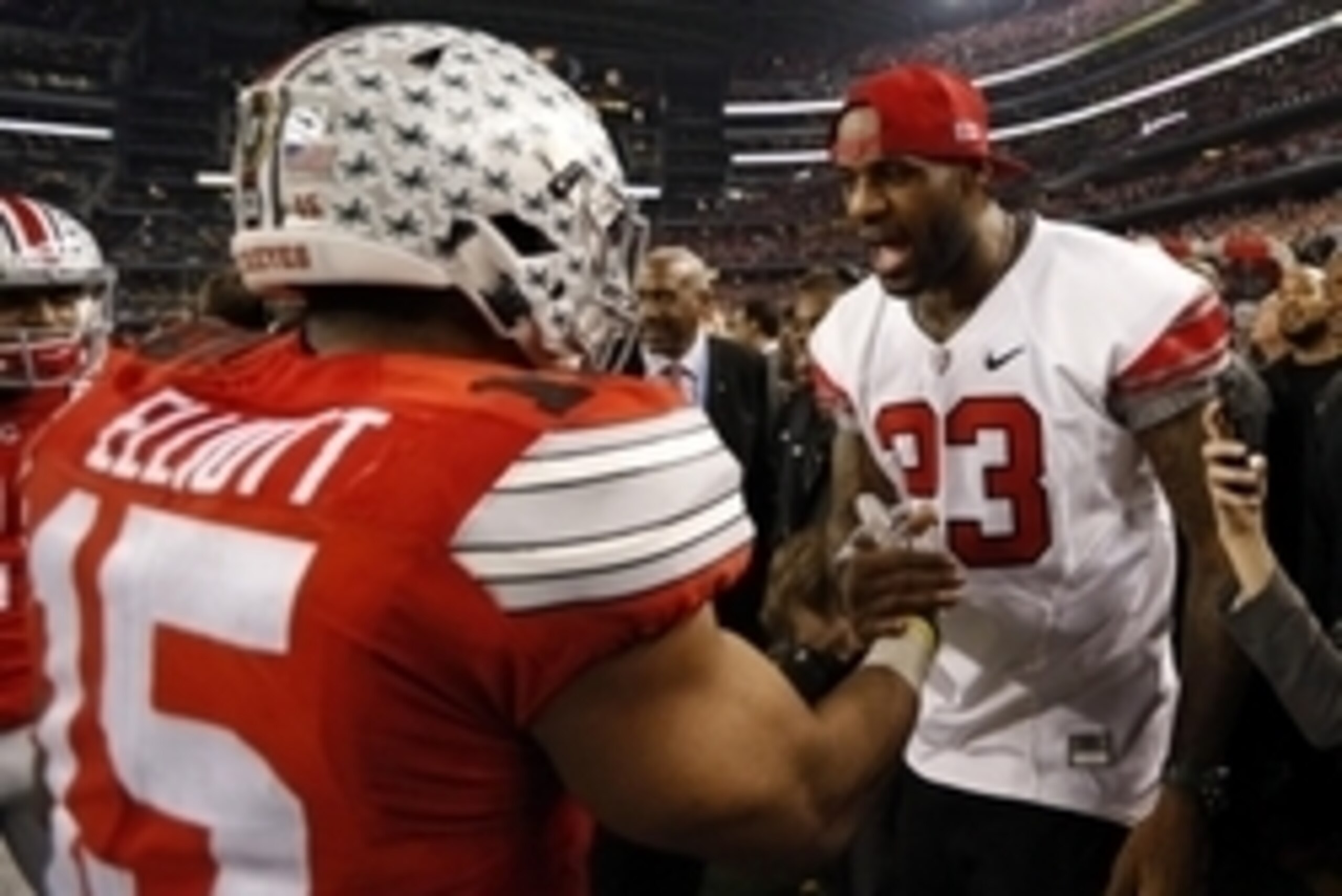 Jan 12, 2015; Arlington, TX, USA;  Ohio State Buckeyes running back Ezekiel Elliott (15) greets Cleveland Cavaliers player LeBron James in the fourth quarter against the Oregon Ducks in the 2015 CFP National Championship Game at AT&T Stadium. Mandatory Cr