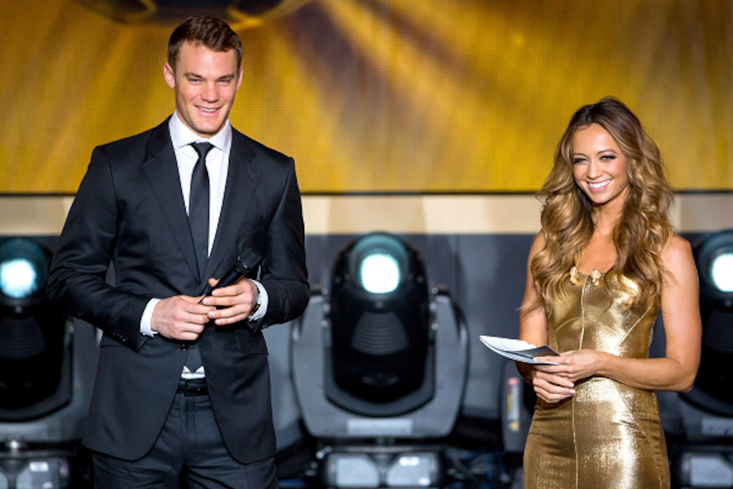 ZURICH, SWITZERLAND - JANUARY 12: Presenter Kate Abdo (R) speaks with FIFA Ballon d'Or nominee Manuel Neuer of Germany and FC Bayern Munich during the FIFA Ballon d'Or Gala 2014 at the Kongresshaus on January 12, 2015 in Zurich, Switzerland. (Photo by Phi