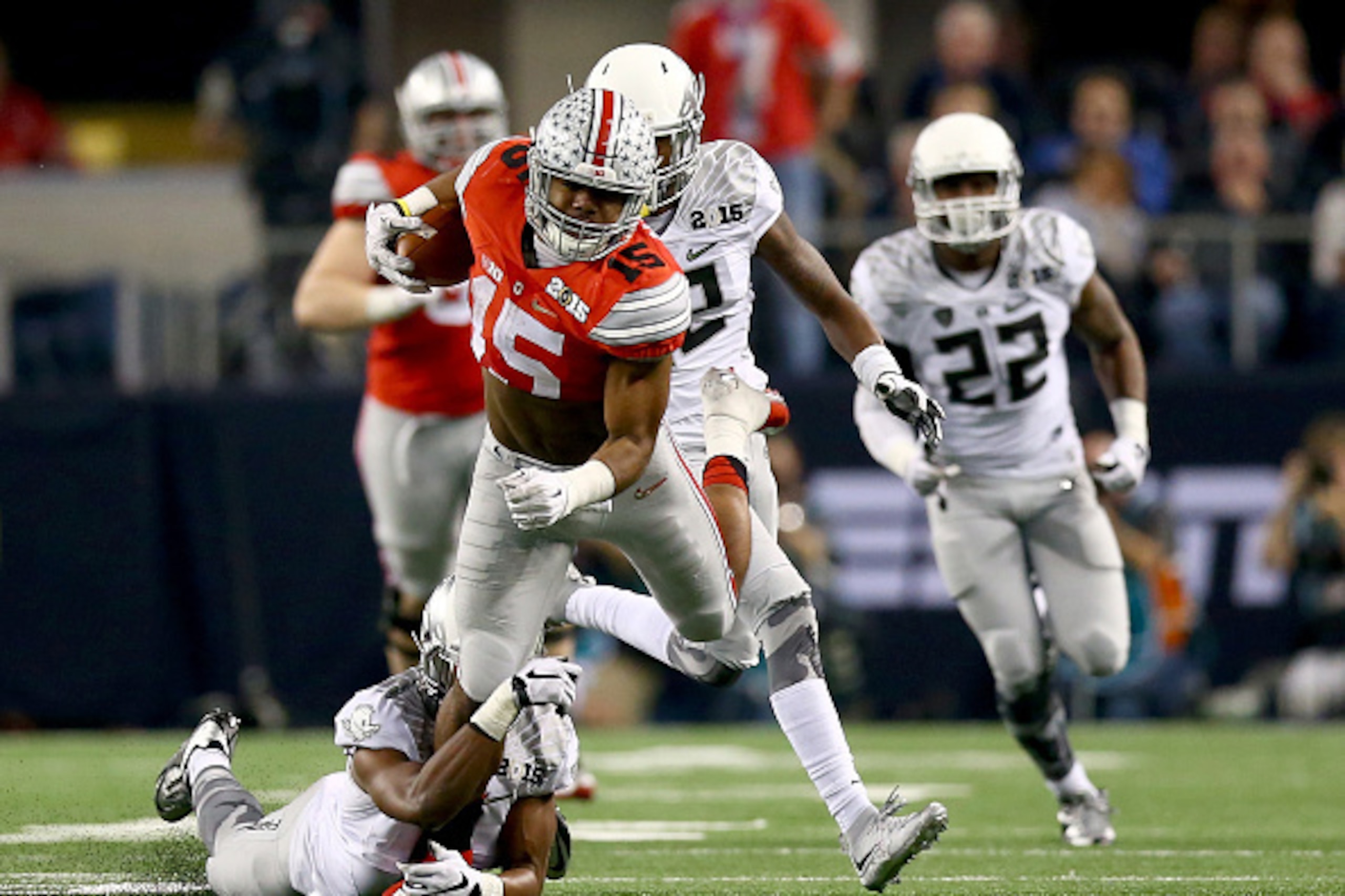 ARLINGTON, TX - JANUARY 12:  Running back Ezekiel Elliott #15 of the Ohio State Buckeyes runs the ball against the Ohio State Buckeyes during the College Football Playoff National Championship Game at AT&T Stadium on January 12, 2015 in Arlington, Texas. 