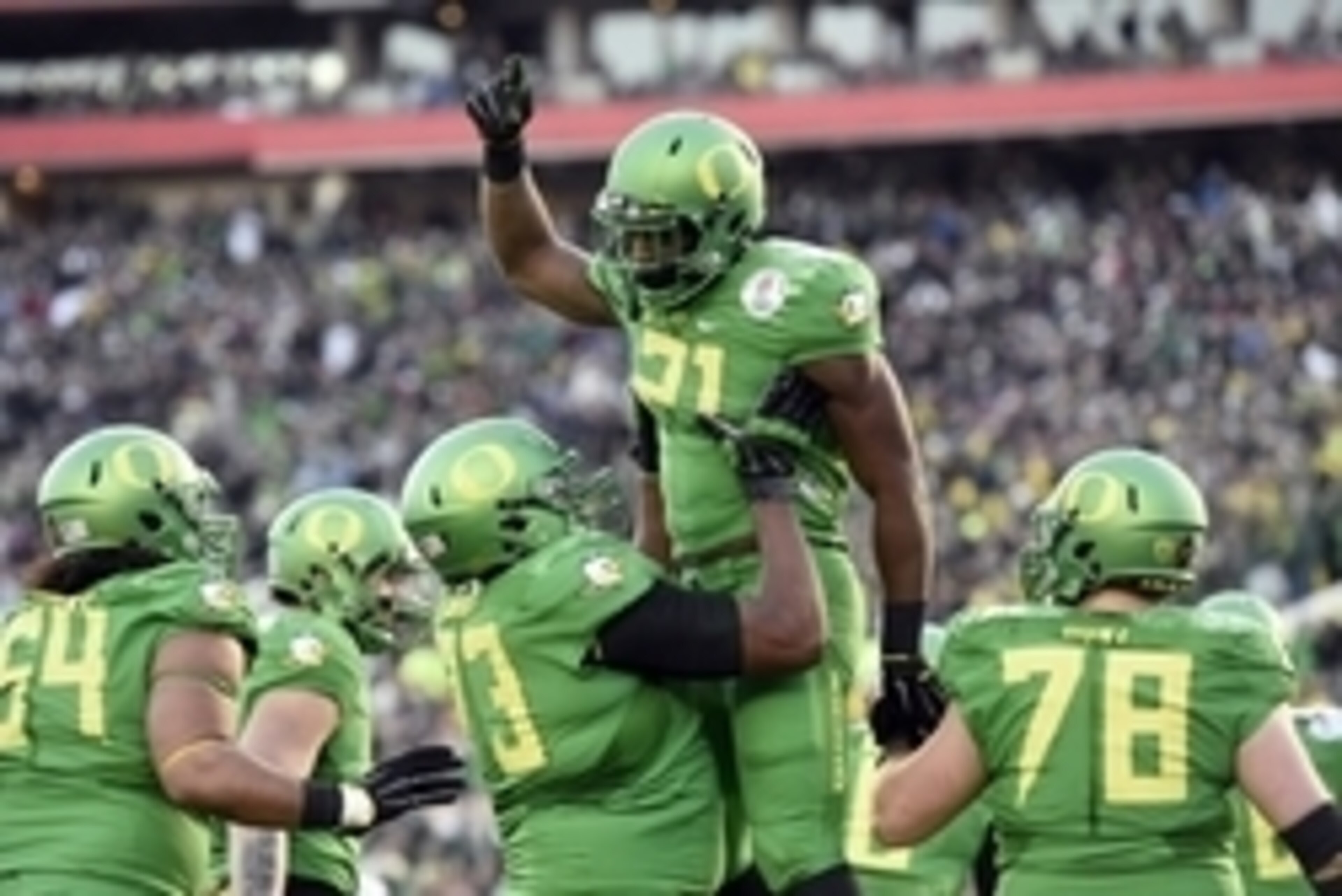 Jan 1, 2015; Pasadena, CA, USA; Oregon Ducks running back Royce Freeman (21) celebrates making a touchdown with teammates during the second half against the Florida State Seminoles in the 2015 Rose Bowl college football game at Rose Bowl. Mandatory Credit Jan 1, 2015; Pasadena, CA, USA; Oregon Ducks running back Royce Freeman (21) celebrates making a touchdown with teammates during the second half against the Florida State Seminoles in the 2015 Rose Bowl college football game at Rose Bowl. Mandatory Credit