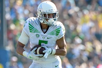 PASADENA, CA - OCTOBER 11:  Devon Allen #5 of the Oregon Ducks runs after his catch against the UCLA Bruins during the third quarter at Rose Bowl on October 11, 2014 in Pasadena, California. The Ducks won 42-30.  (Photo by Harry How/Getty Images)