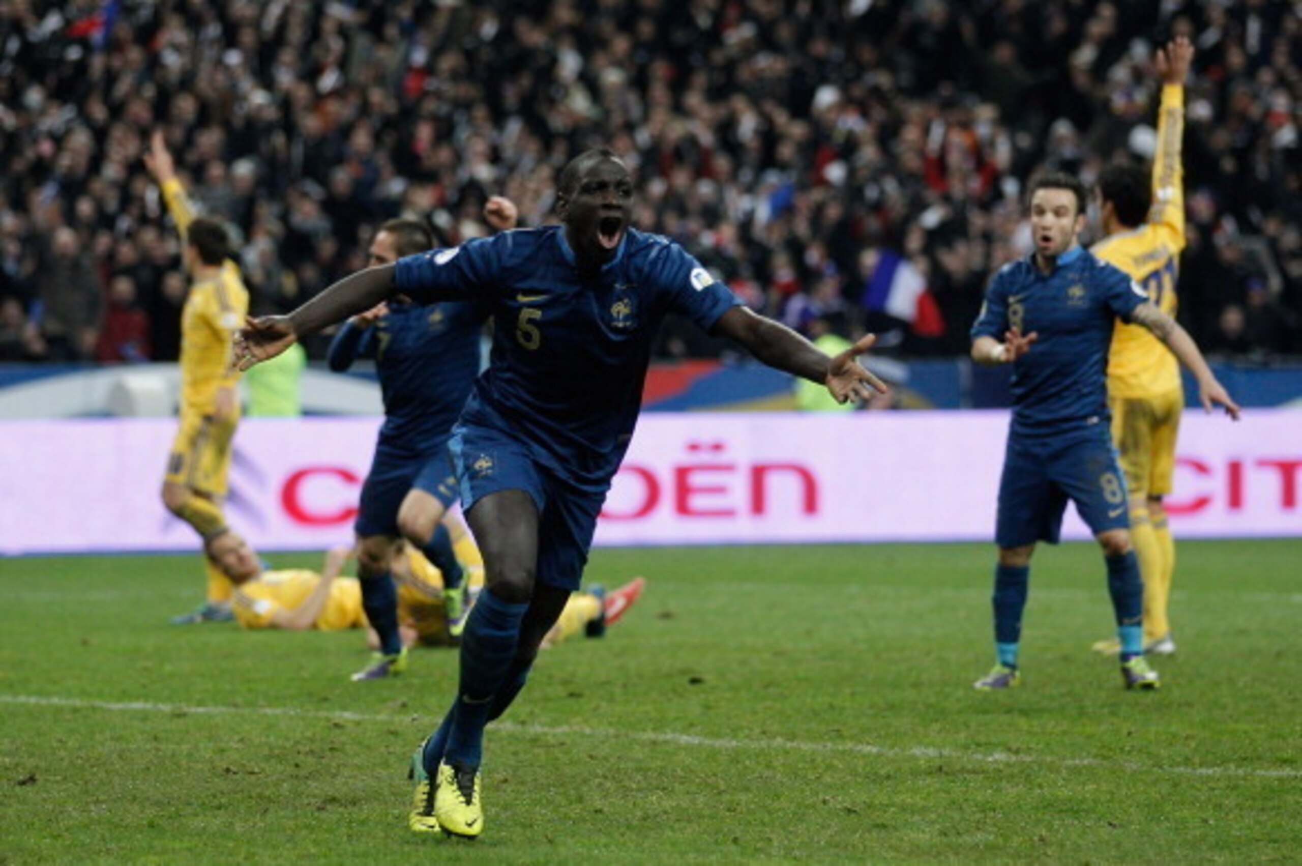 PARIS, FRANCE - NOVEMBER 19:  Mamadou Sakho of France celebrates scoring his side's third goal during the FIFA 2014 World Cup Qualifier 2nd Leg Playoff between France and Ukraine at the Stade de France on November 19, 2013 in Paris, France.  (Photo by Har