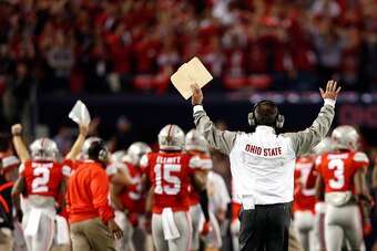 ARLINGTON, TX - JANUARY 12:  Head Coach Urban Meyer of the Ohio State Buckeyes reacts after a play in the fourth quarter against the Oregon Ducks during the College Football Playoff National Championship Game at AT&T Stadium on January 12, 2015 in Arlingt
