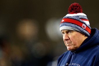 FOXBORO, MA - JANUARY 10:  Head coach Bill Belichick of the New England Patriots looks on from the sideline late in the second half against the Baltimore Ravens during the 2014 AFC Divisional Playoffs game at Gillette Stadium on January 10, 2015 in Foxbor