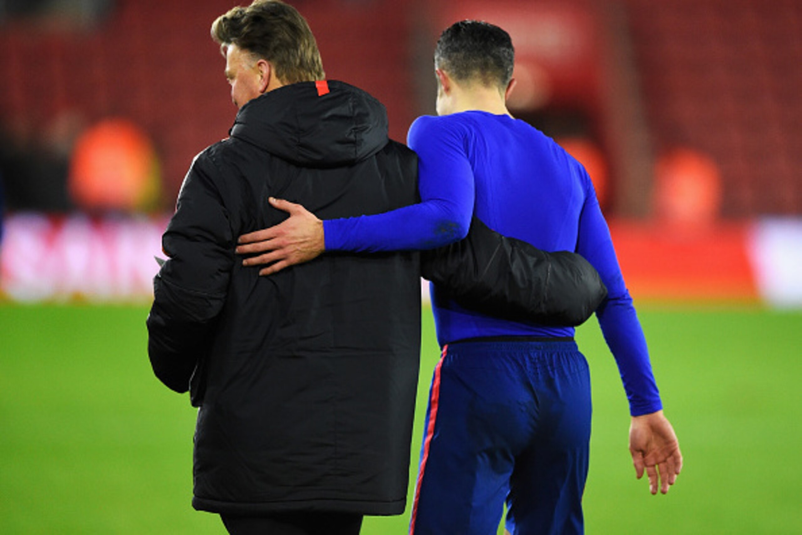 SOUTHAMPTON, ENGLAND - DECEMBER 08:  Louis van Gaal, manager of Manchester United hugs Robin van Persie of Manchester United after the Barclays Premier League match between Southampton and Manchester United at St Mary's Stadium on December 8, 2014 in Sout