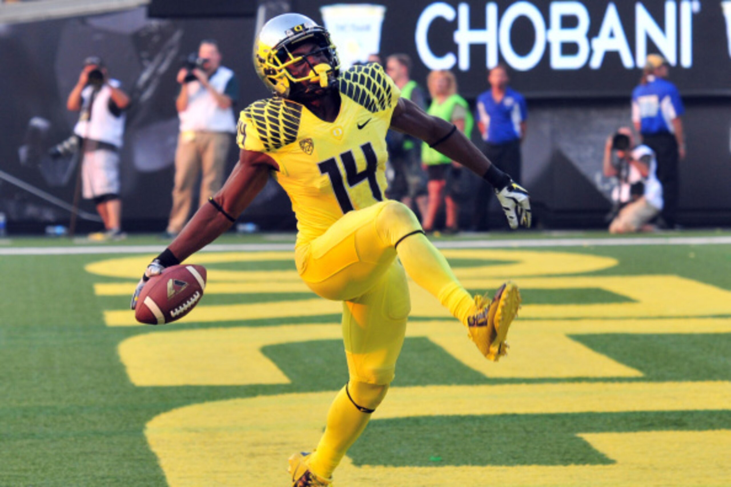 EUGENE, OR -SEPTEMBER 06: Defensive back Ifo Ekpre-Olomu #14 of the Oregon Ducks celebrates after intercepting a pass during the fourth quarter of the game against the Michigan State Spartans at Autzen Stadium on September 6, 2014 in Eugene, Oregon. Orego